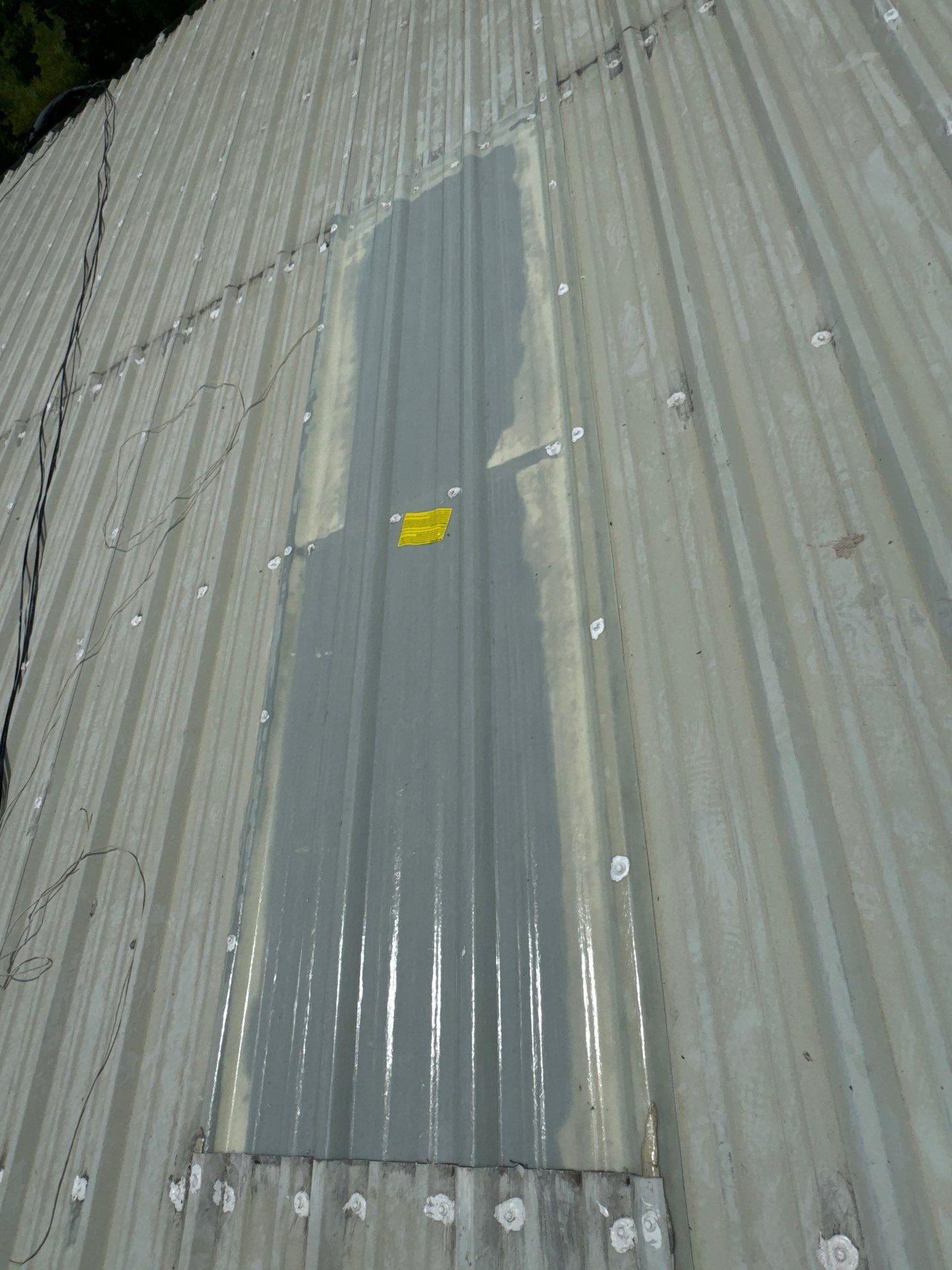 Metal Roof Maintenance- Skylight Installation  by Associates Roofing Unlimited 
