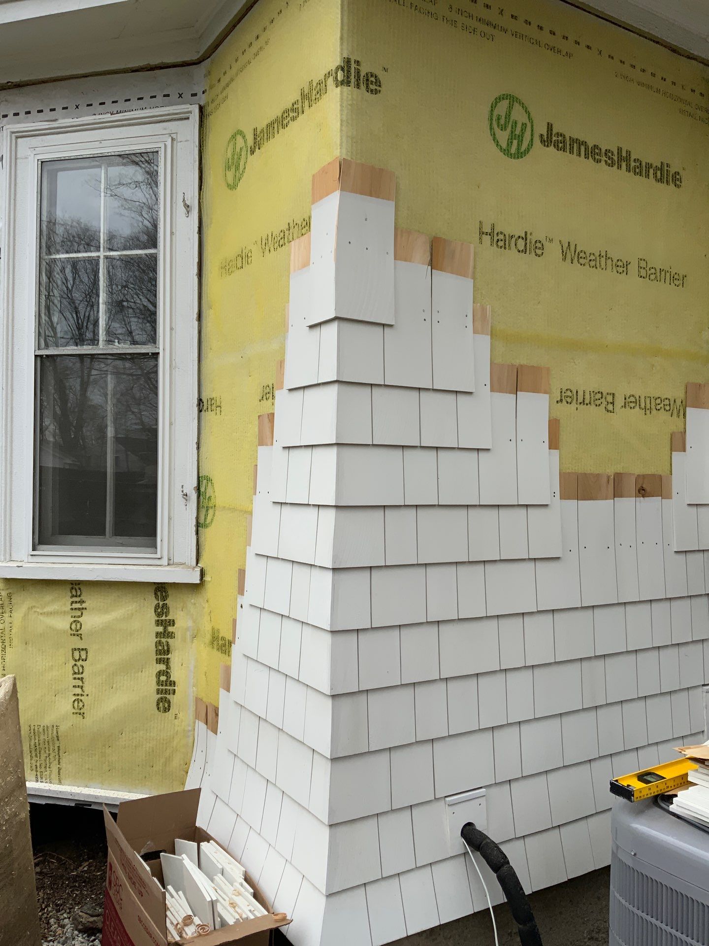 White cedar shingles and windows in Wayland, MA by UBrothers Construction