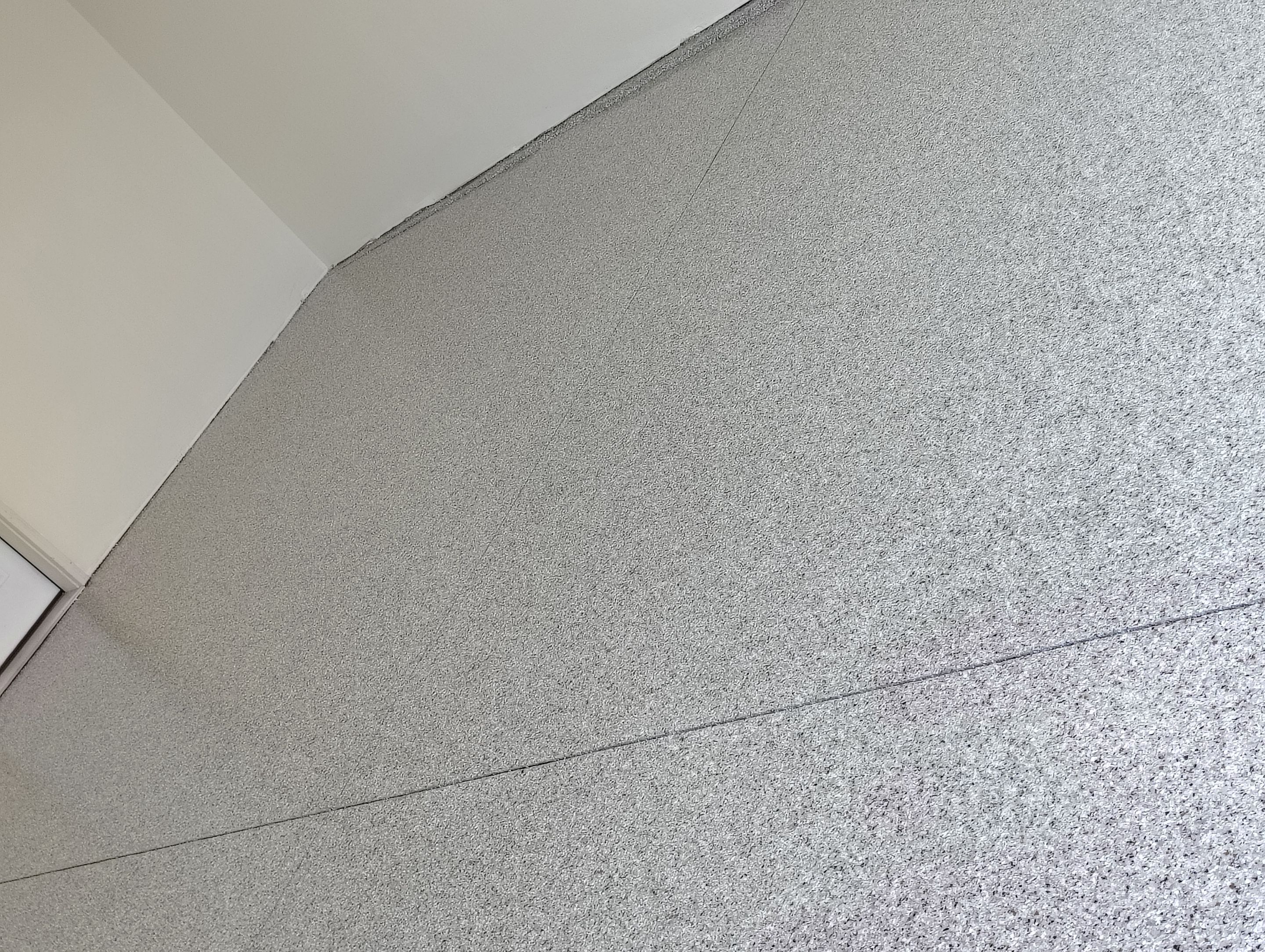 Garage Floor Coating with Coyote Decorative Chip in Tea by Select Painting, Coatings & Garage Cabinets