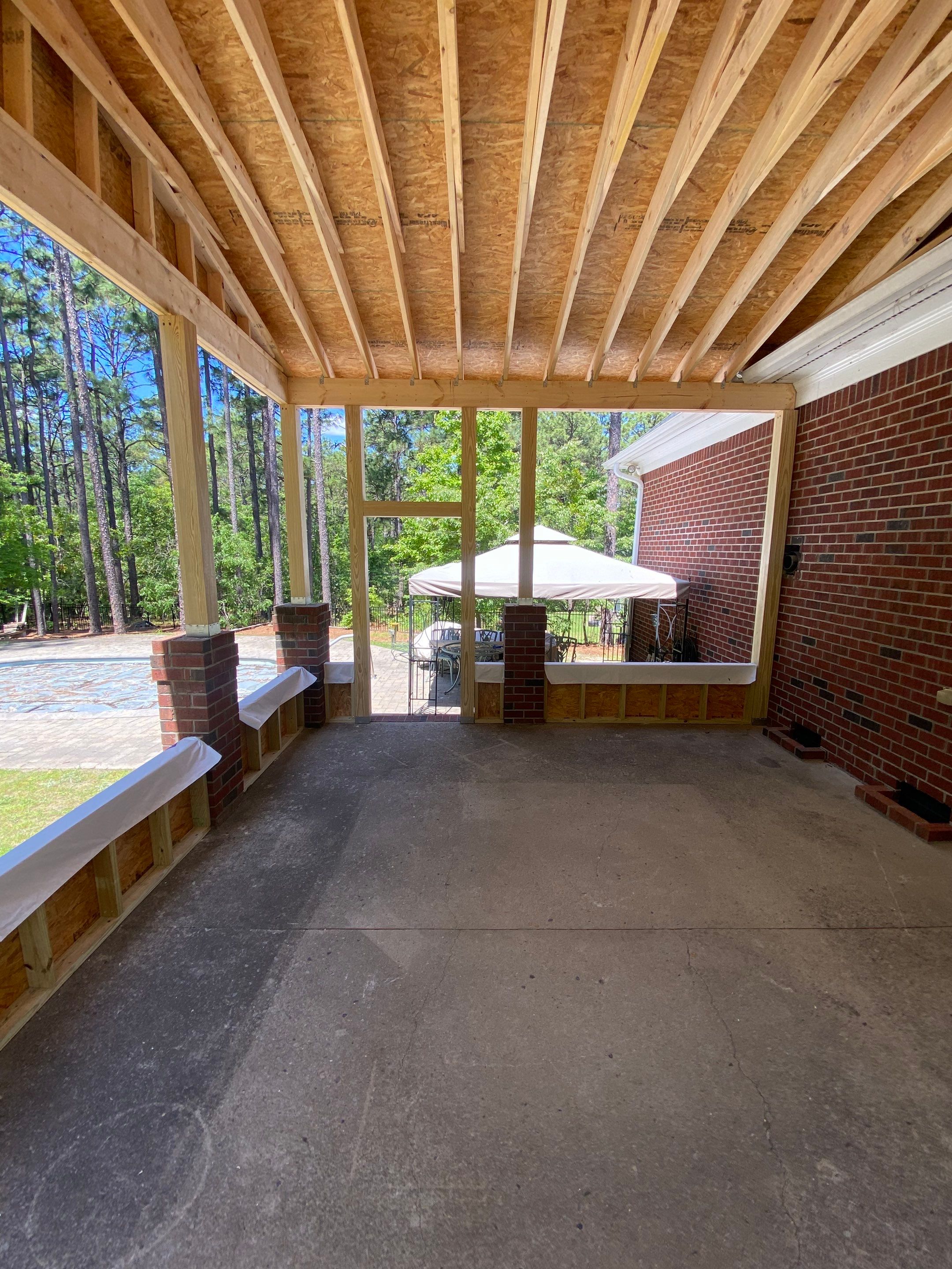 Custom Screened-In Porch Addition with Open Gable Roof in Fayetteville by The Remodeling Company