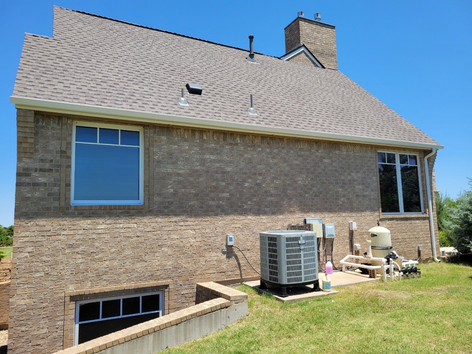 Roof Replacement and Gutter Installation in Edmond, OK by McCann's Roofing and Construction