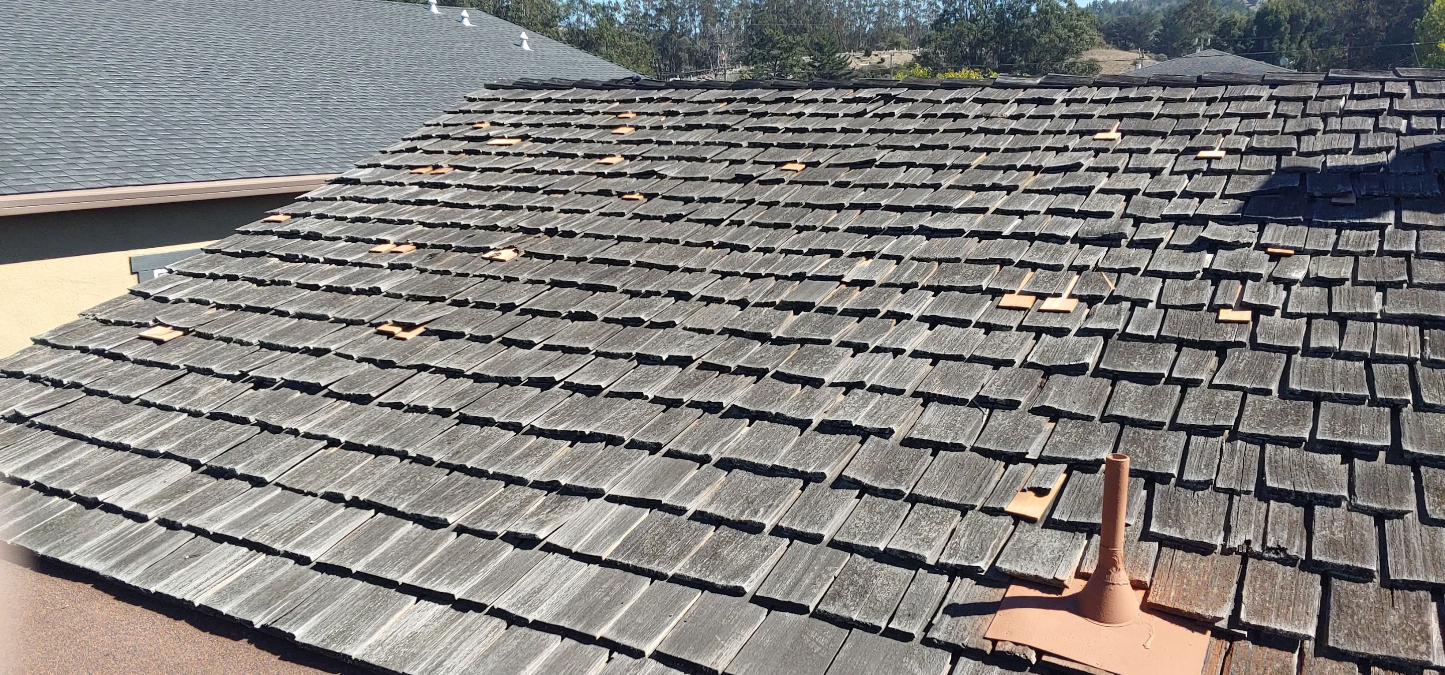 Refurbish and repair shake roof to get ready to sell by Straight Edge Roofing Inc