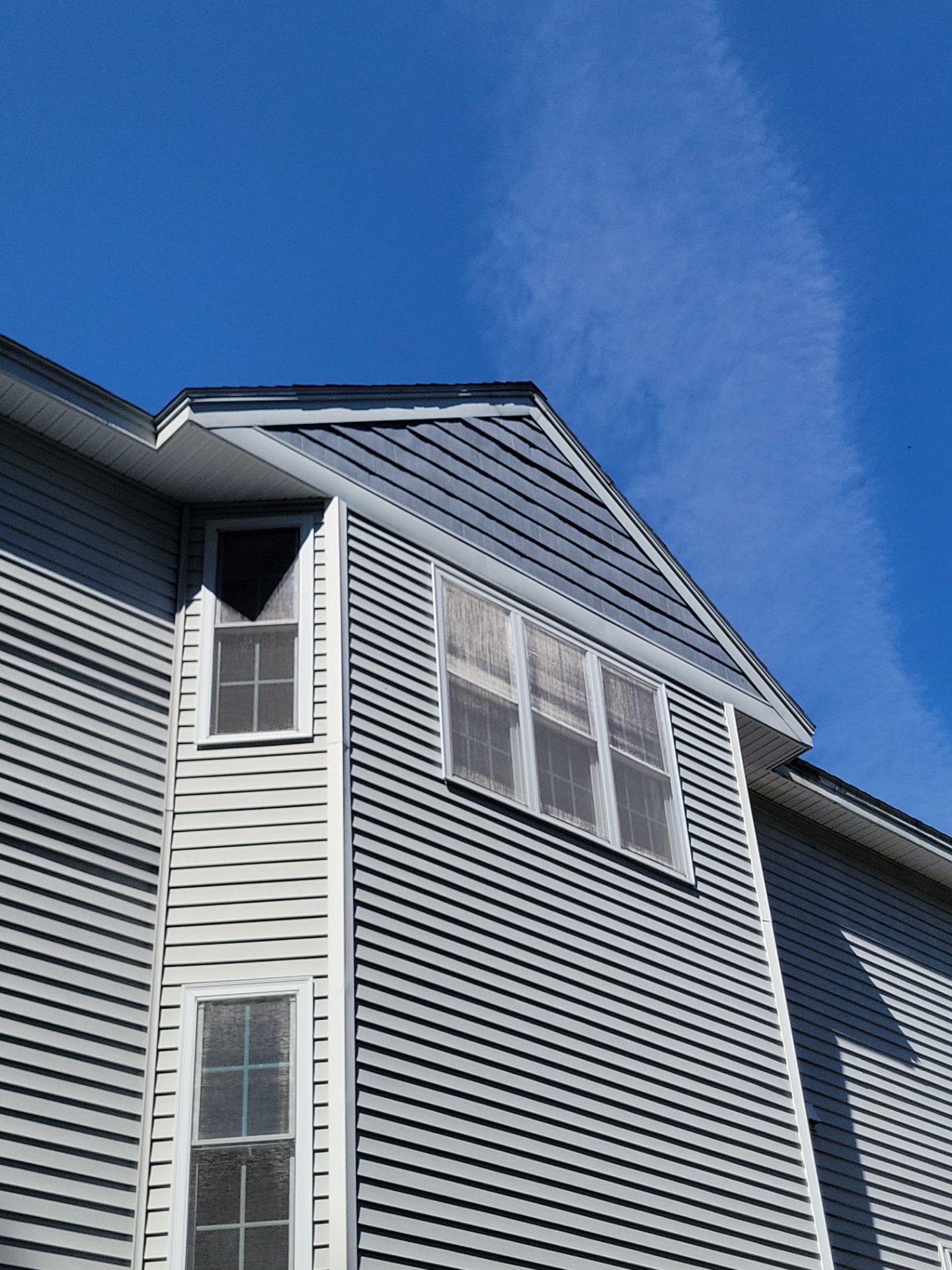 Vinyl Siding Repair in Rochester, NH by CML Roofing and General Contracting