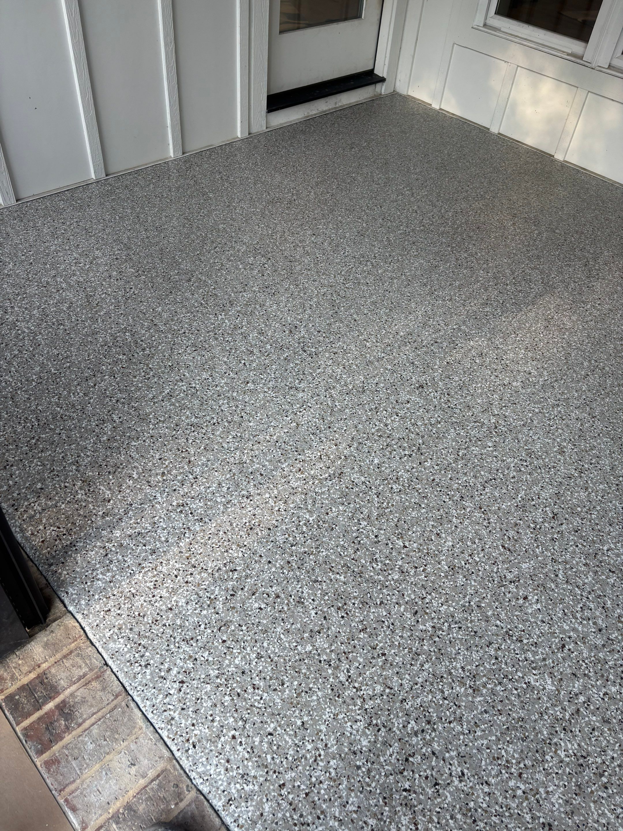 Two Porches Completed Using Creekbed by Elite Floor Solutions
