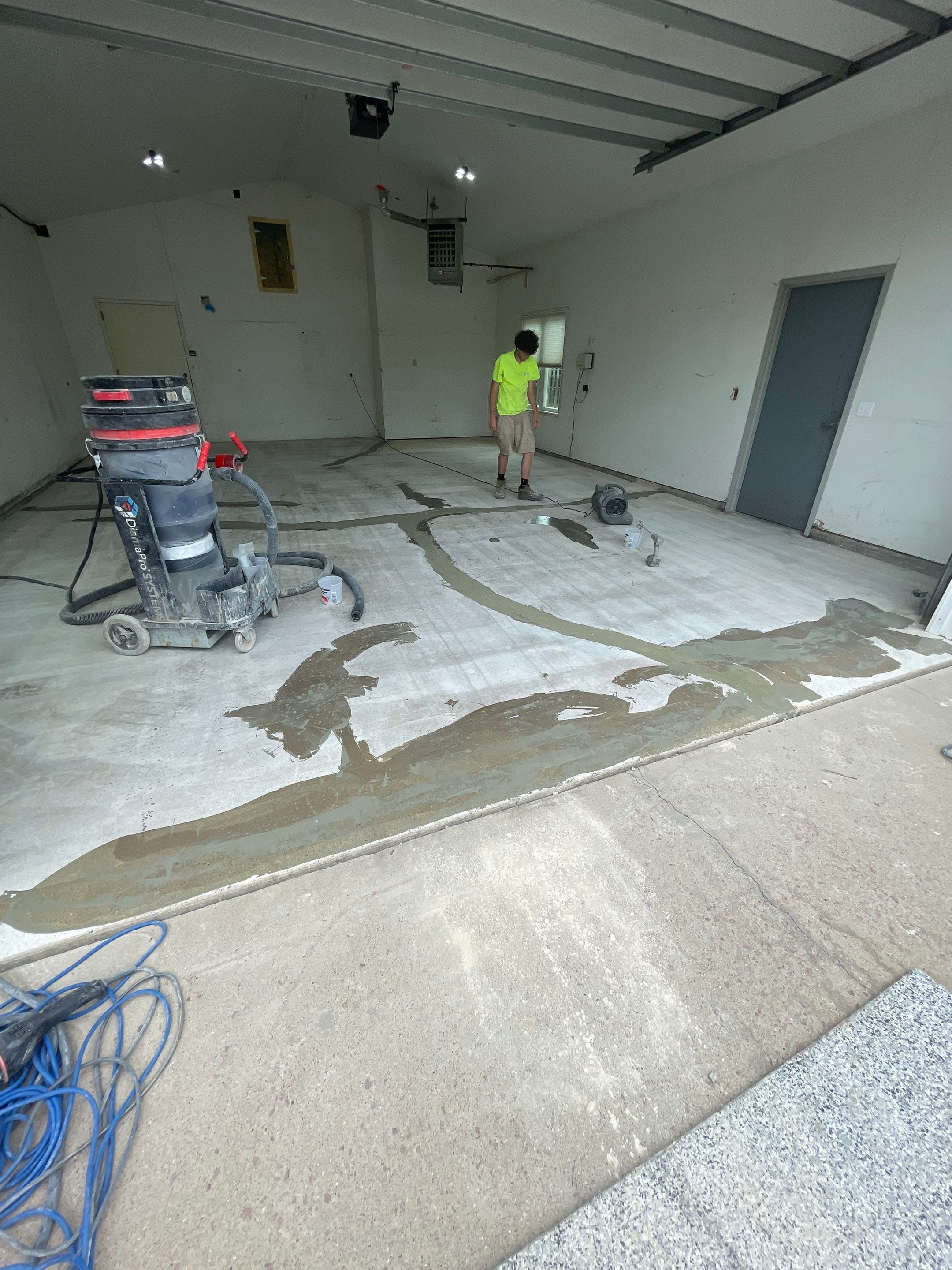 Coyote Flake Concrete Coating for Sioux Falls Garage by Select Painting, Coatings & Garage Cabinets
