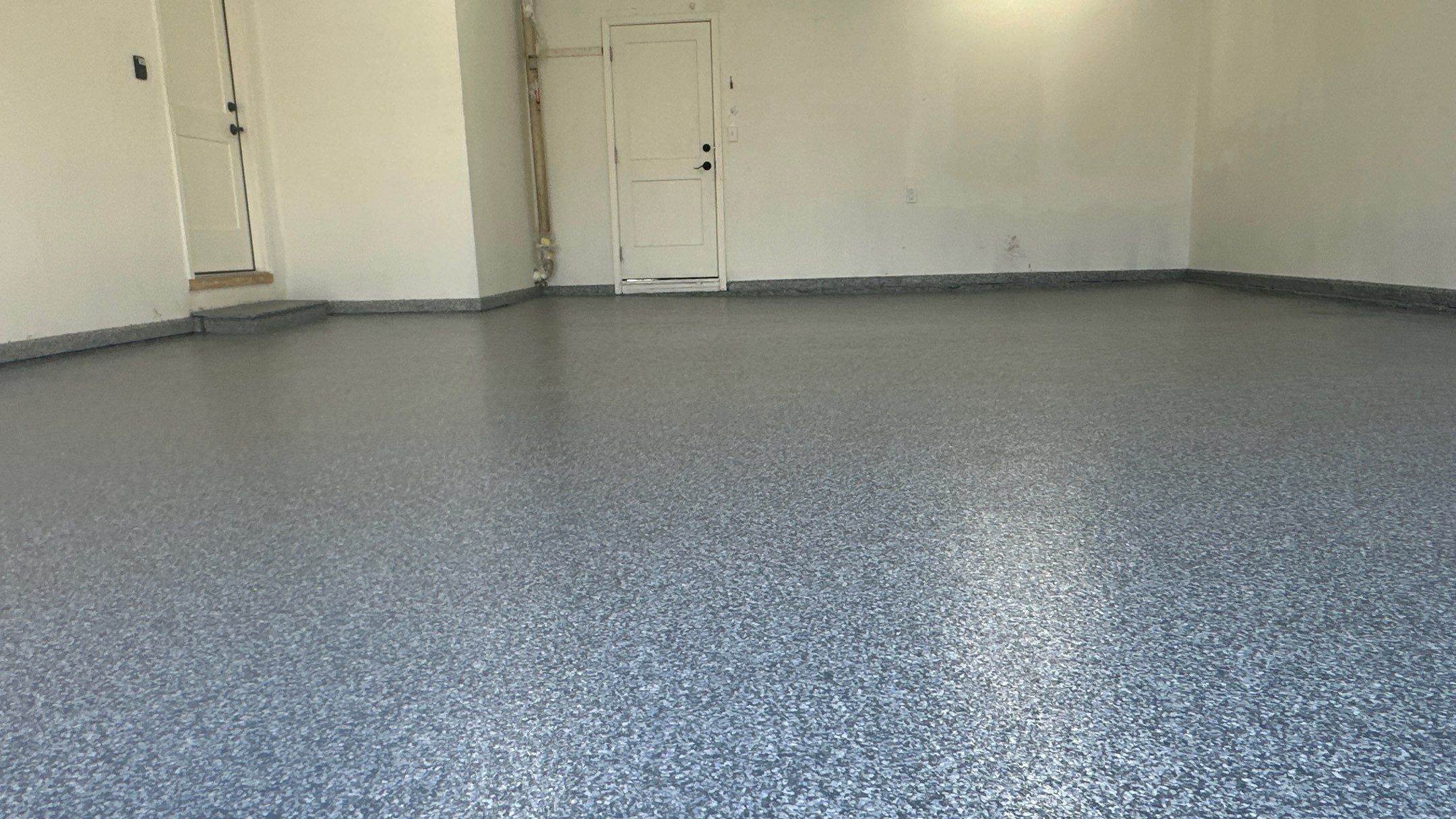 Check Out Anne's New Polar Floor by Banner Garage