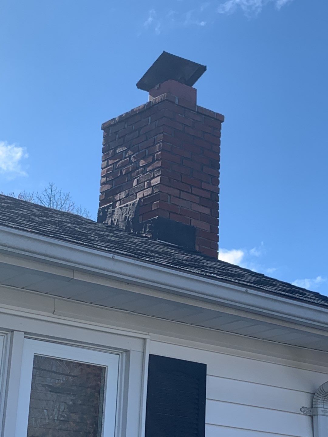 Residential Roofing Repair using Chimney Flashing by A Plus Exterior
