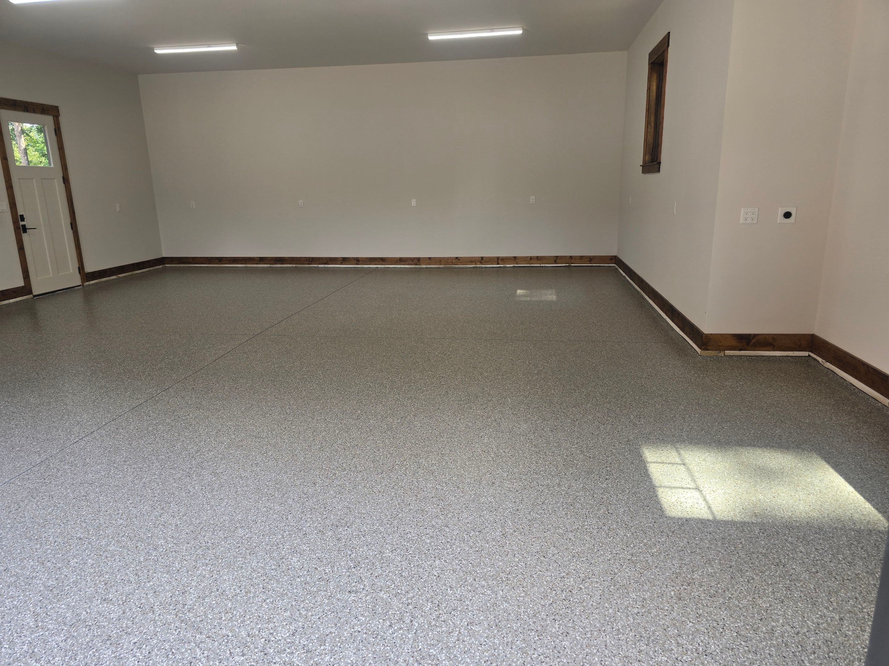 Garage using Creekbed by Elite Floor Solutions