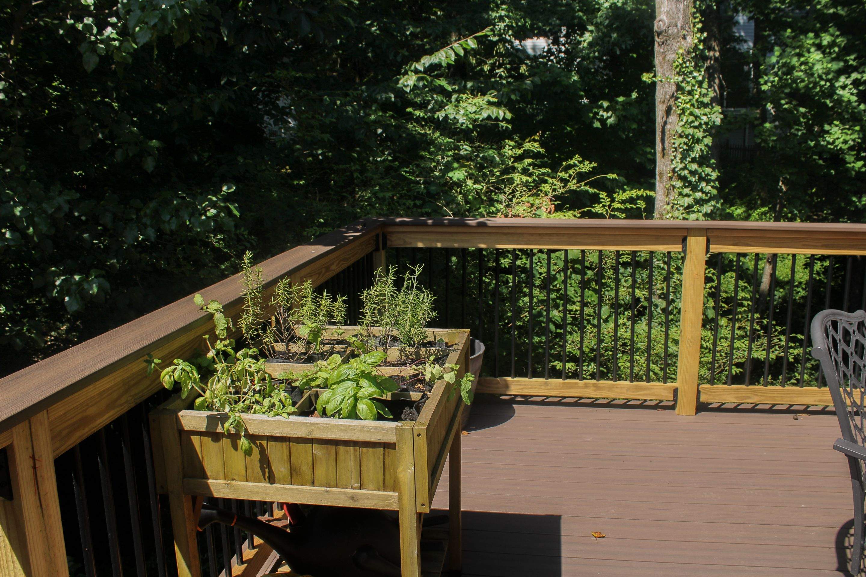 Deckorators Voyage Deck and Shed Style Covered Porch Build with Drink Rail by Nelson Exteriors 