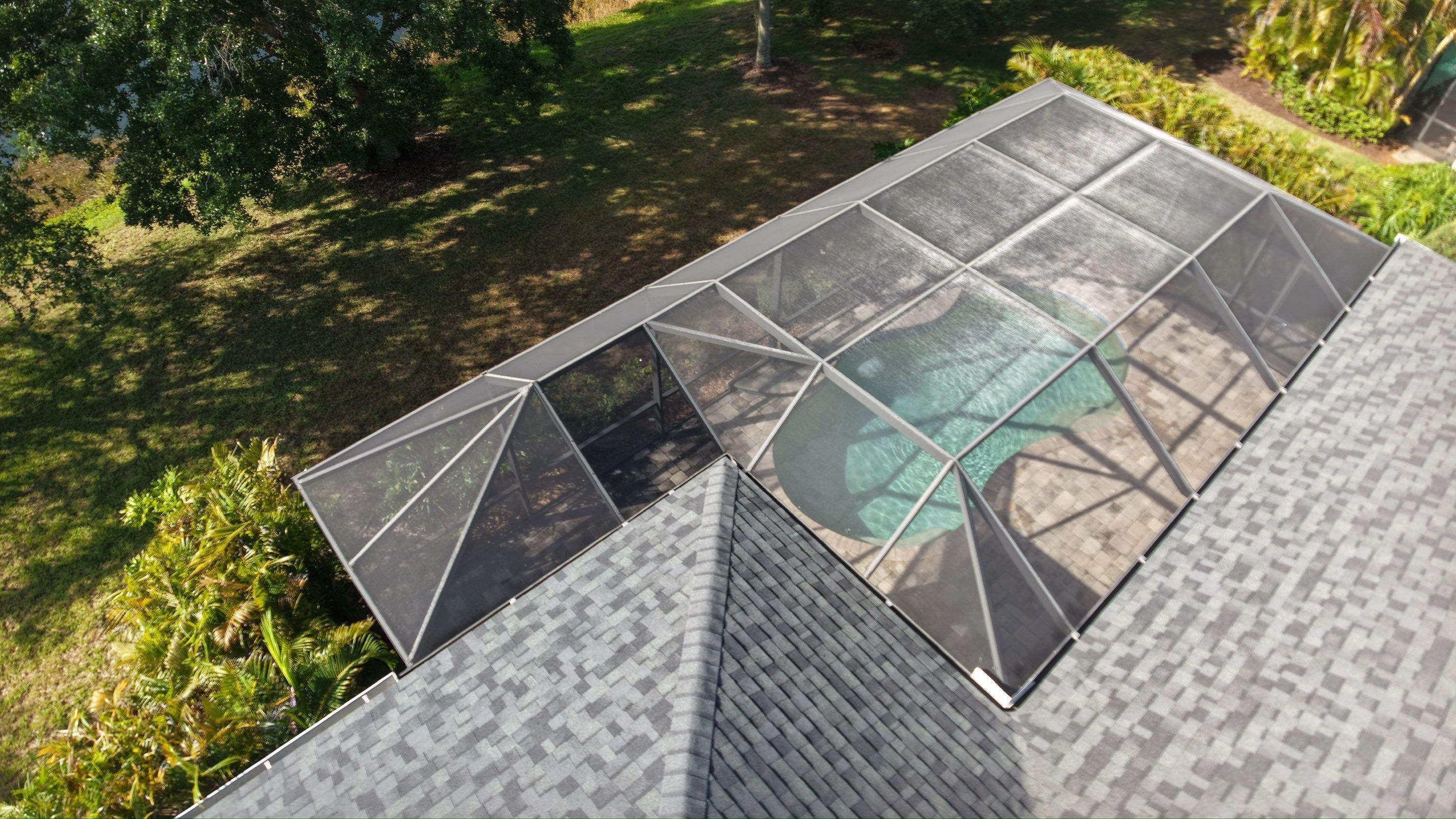 Residential Roof Installation With Estate Grey Architectural Shingles in Bradenton by Trinity Restoration and Roofing LLC