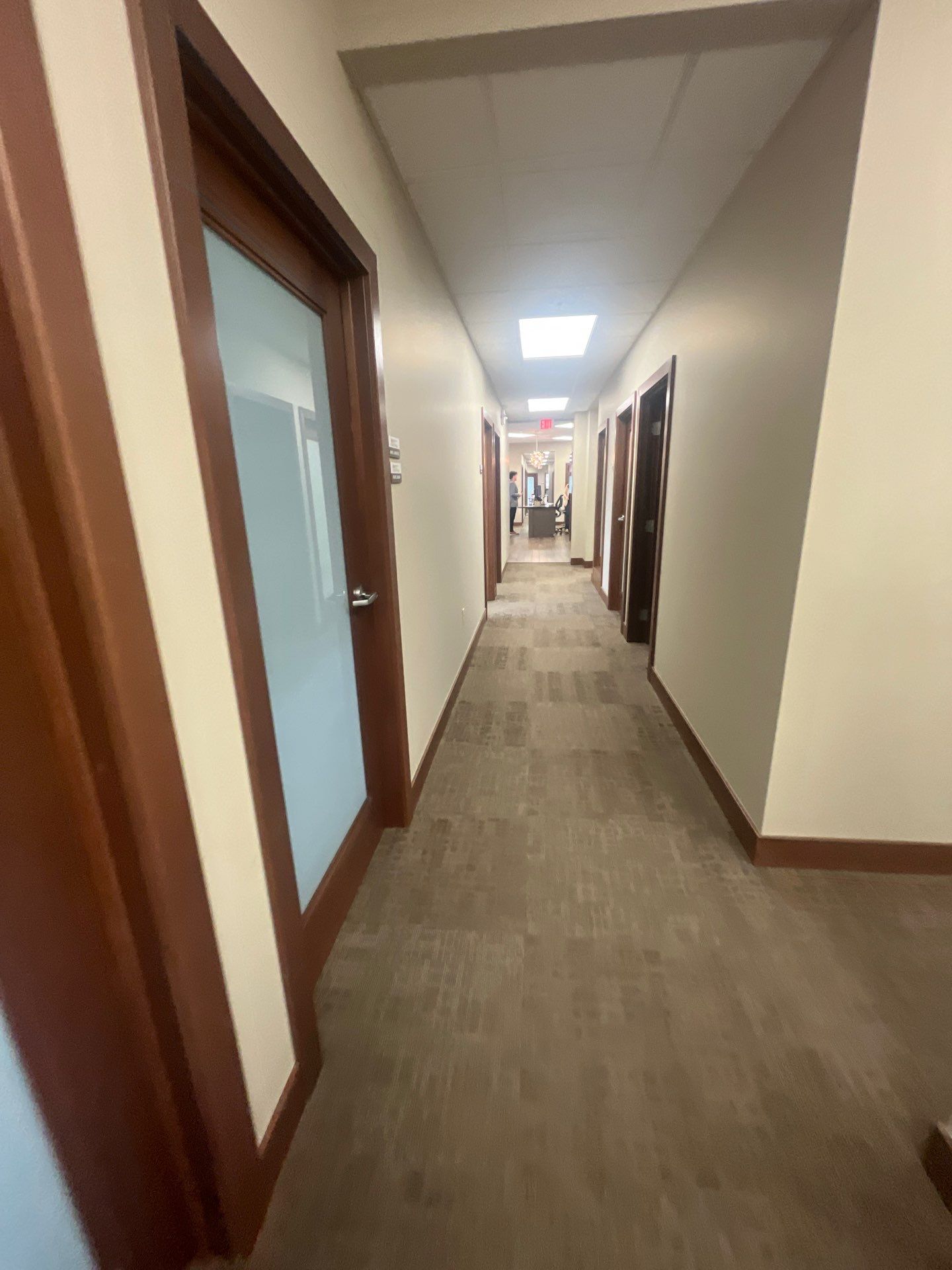 Commercial Office Interior Remodel and Modern Suite Refresh in Sioux Falls by Select Painting, Coatings & Garage Cabinets