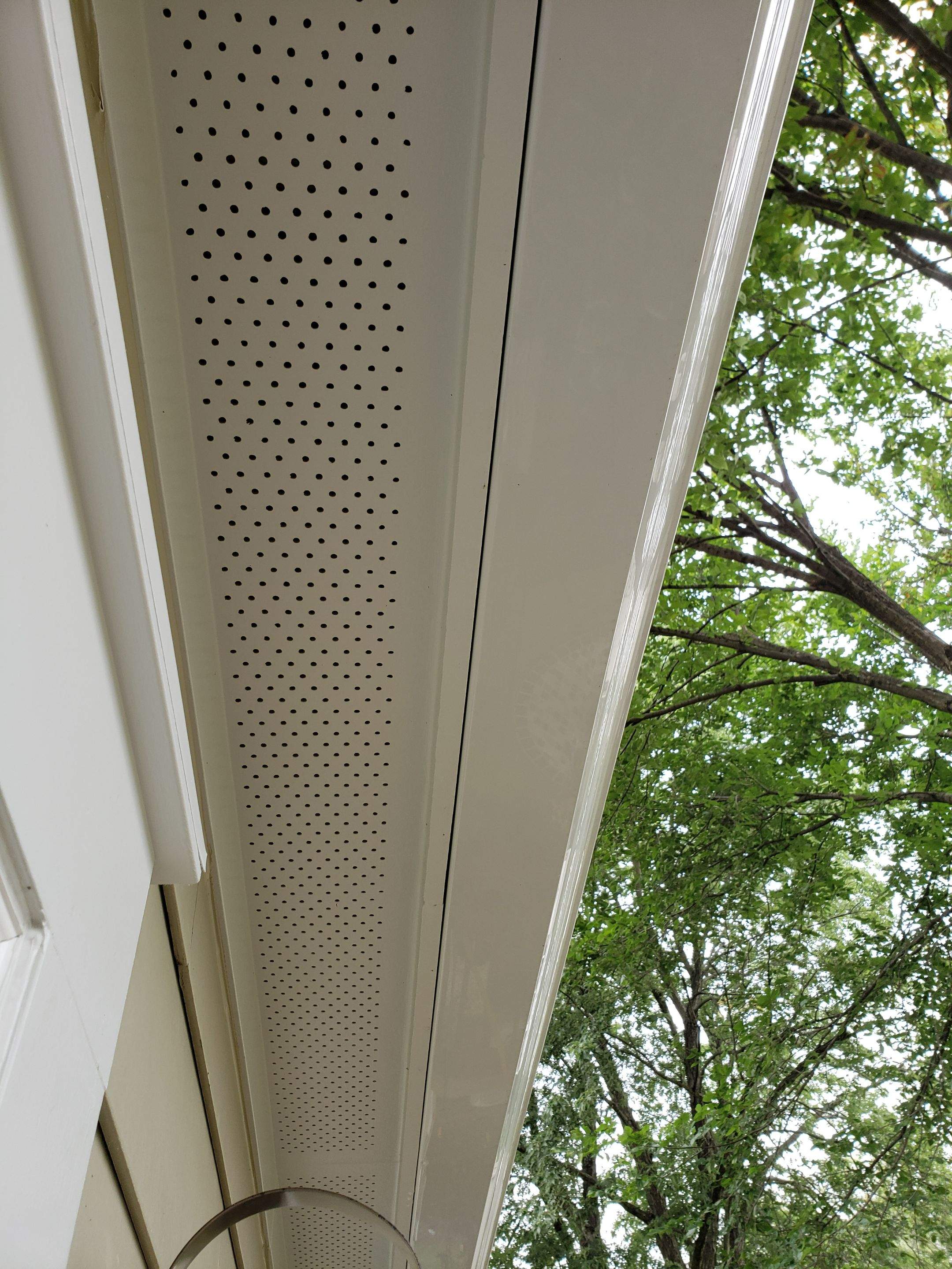 New composite windows and fiber cement siding with trim and gutters by Window Depot of Annapolis
