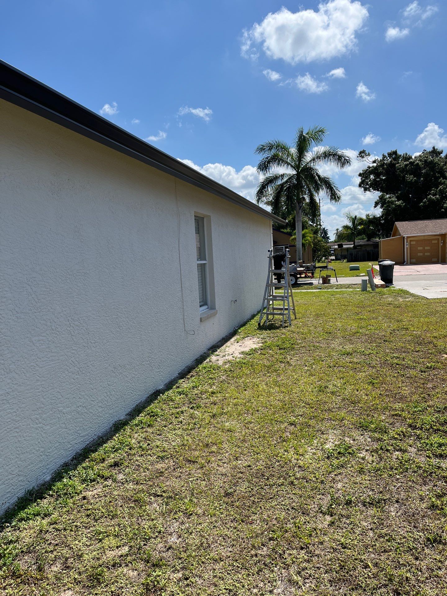 Black Seamless Gutters and Downspouts in Fort Myers FL by Gutter Professors