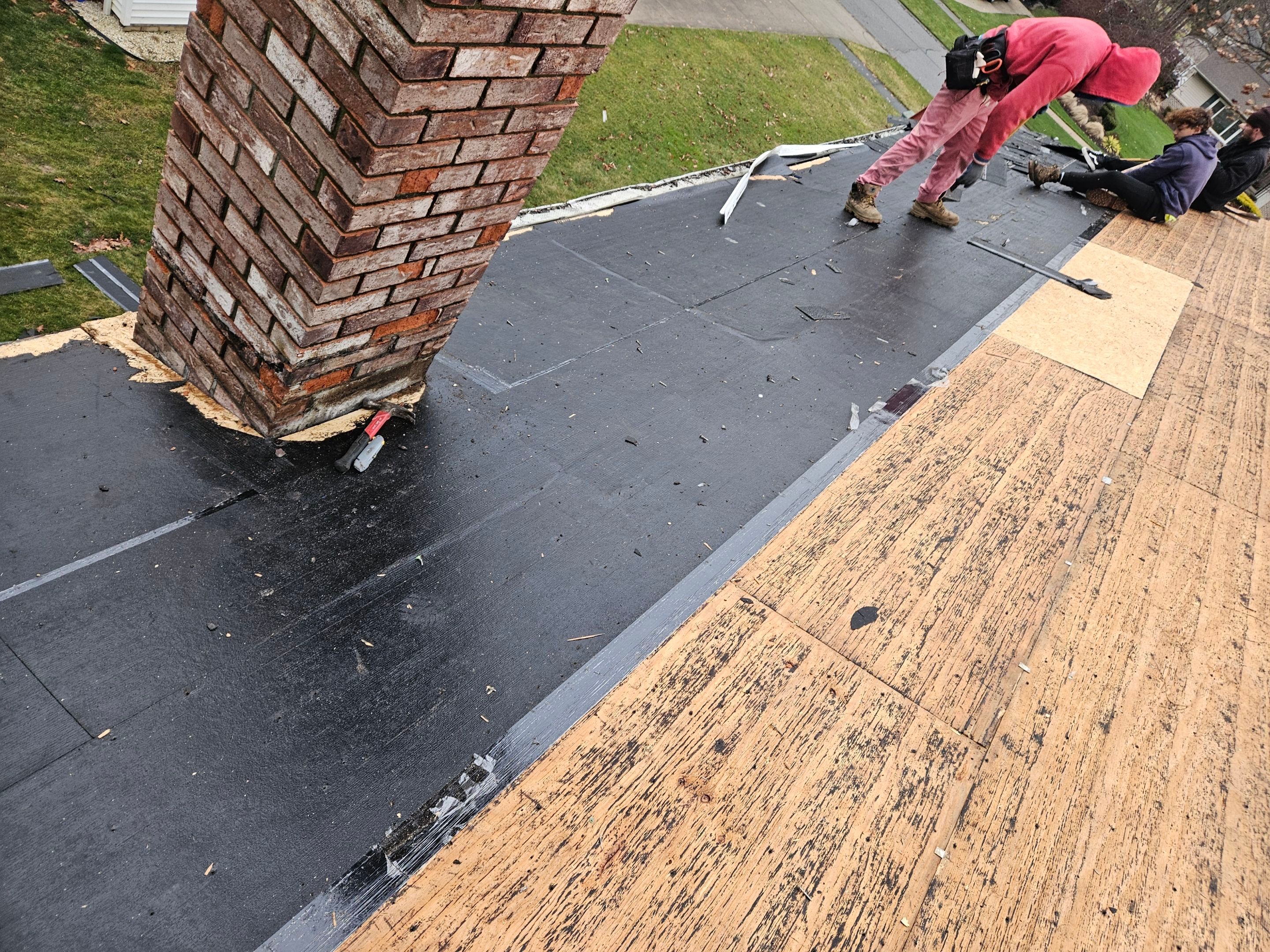Residential Roof Replacement using Owens Corning Onyx Black by Absolute Roofing and Construction