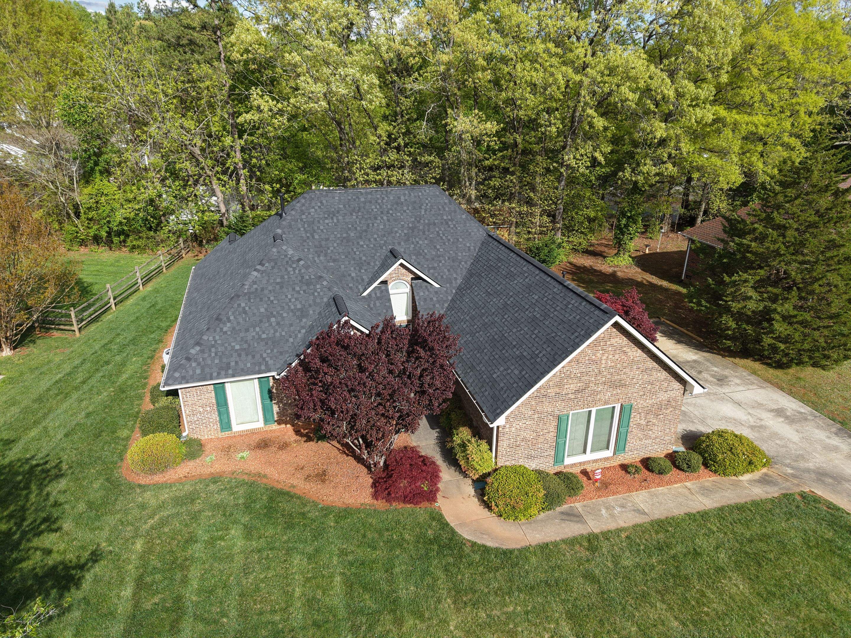 Residential Roofing Installation using TAMKO TITAN XT Rustic Black by RISE Roofing & Restoration, LLC