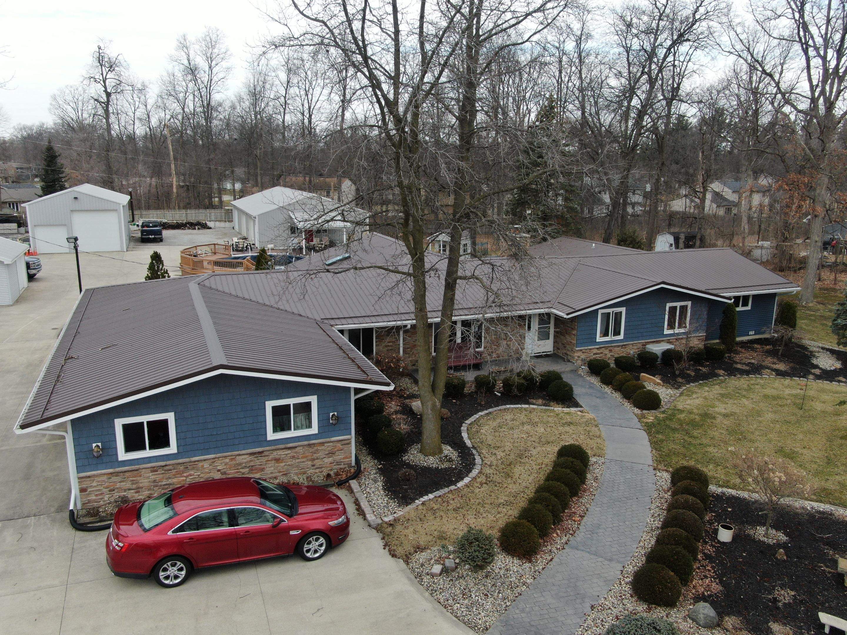 Residential Roofing Installation using Exposed Fastener Metal Roof by 4Ever Metal Roofing