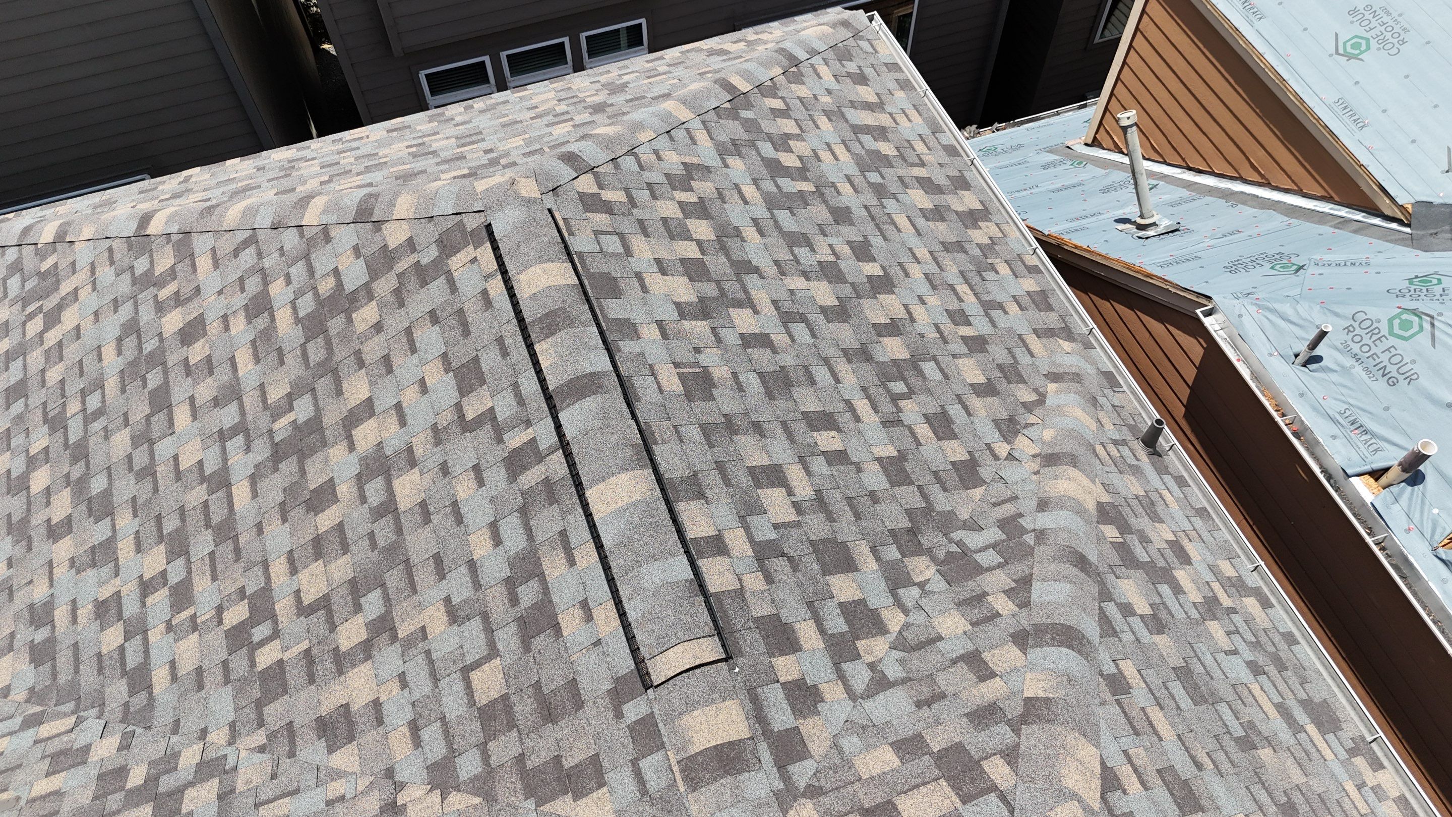Residential Roofing Installation on a Highrise Duplex using IKO Dynasty by Core Four Roofing