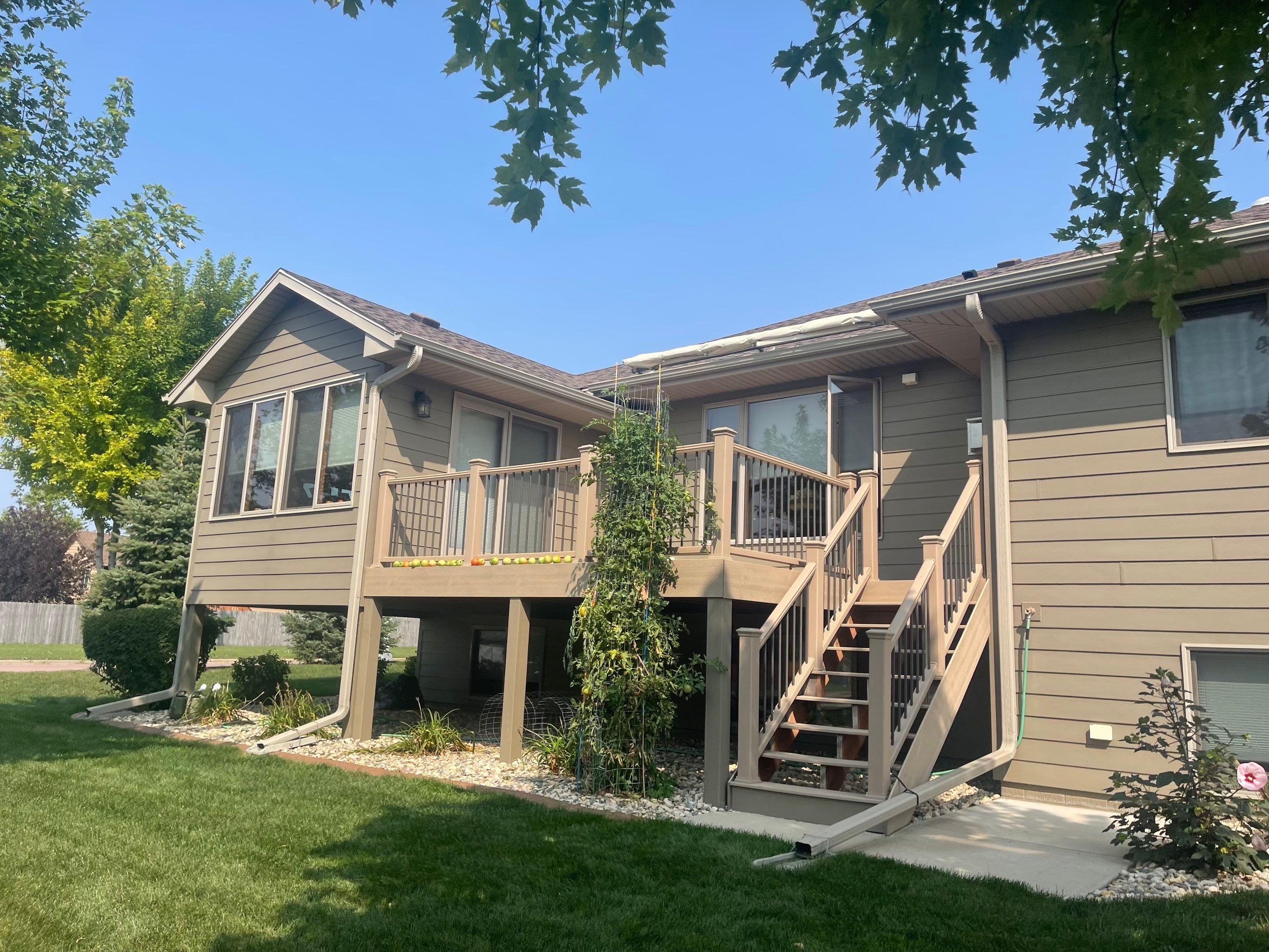 Residential Exterior Siding and Trim Painting in Sioux Falls by Select Painting, Coatings & Garage Cabinets