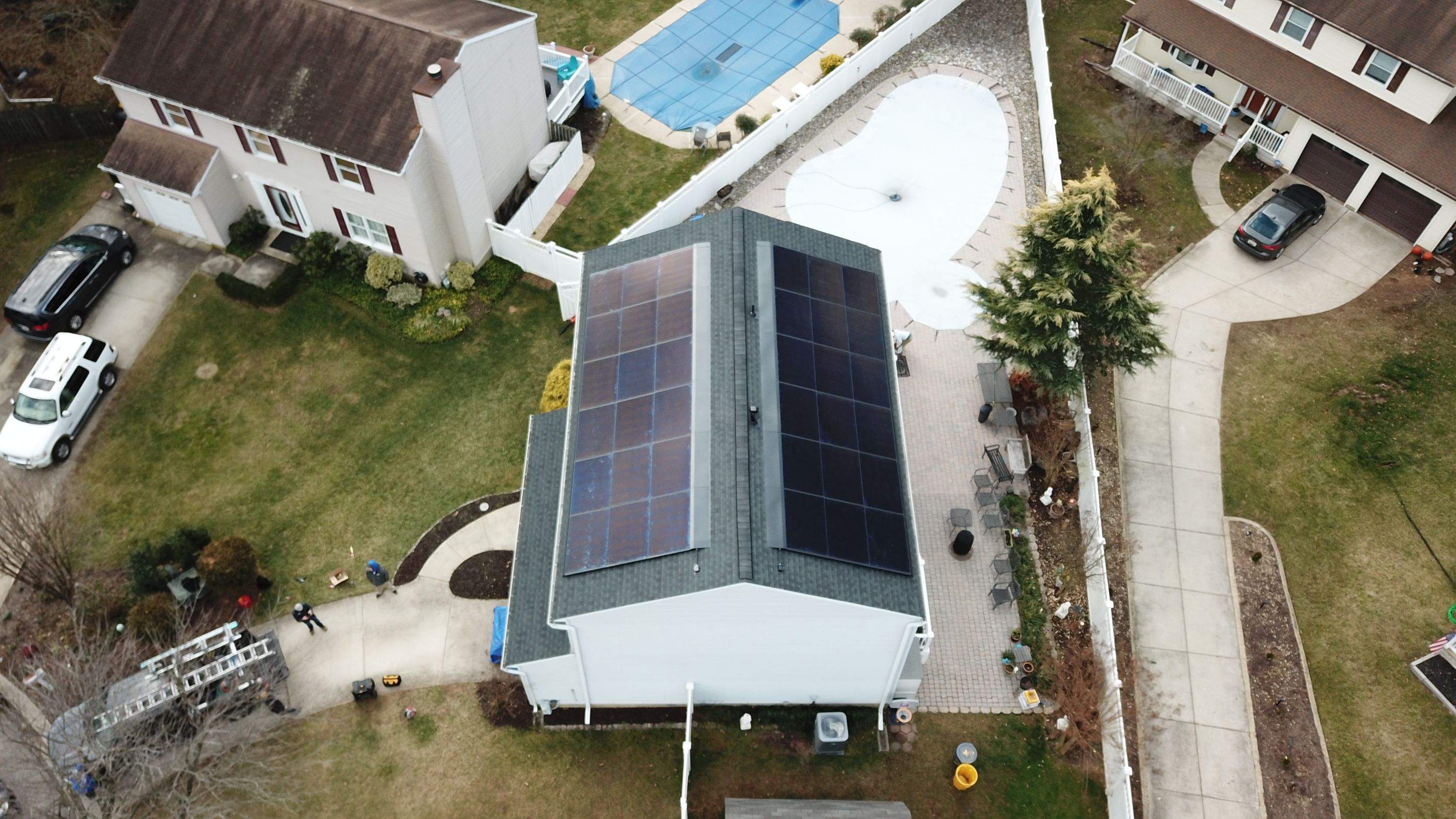 Roof Replacement with GAF Decotech integrated solar panels by American Home Contractors