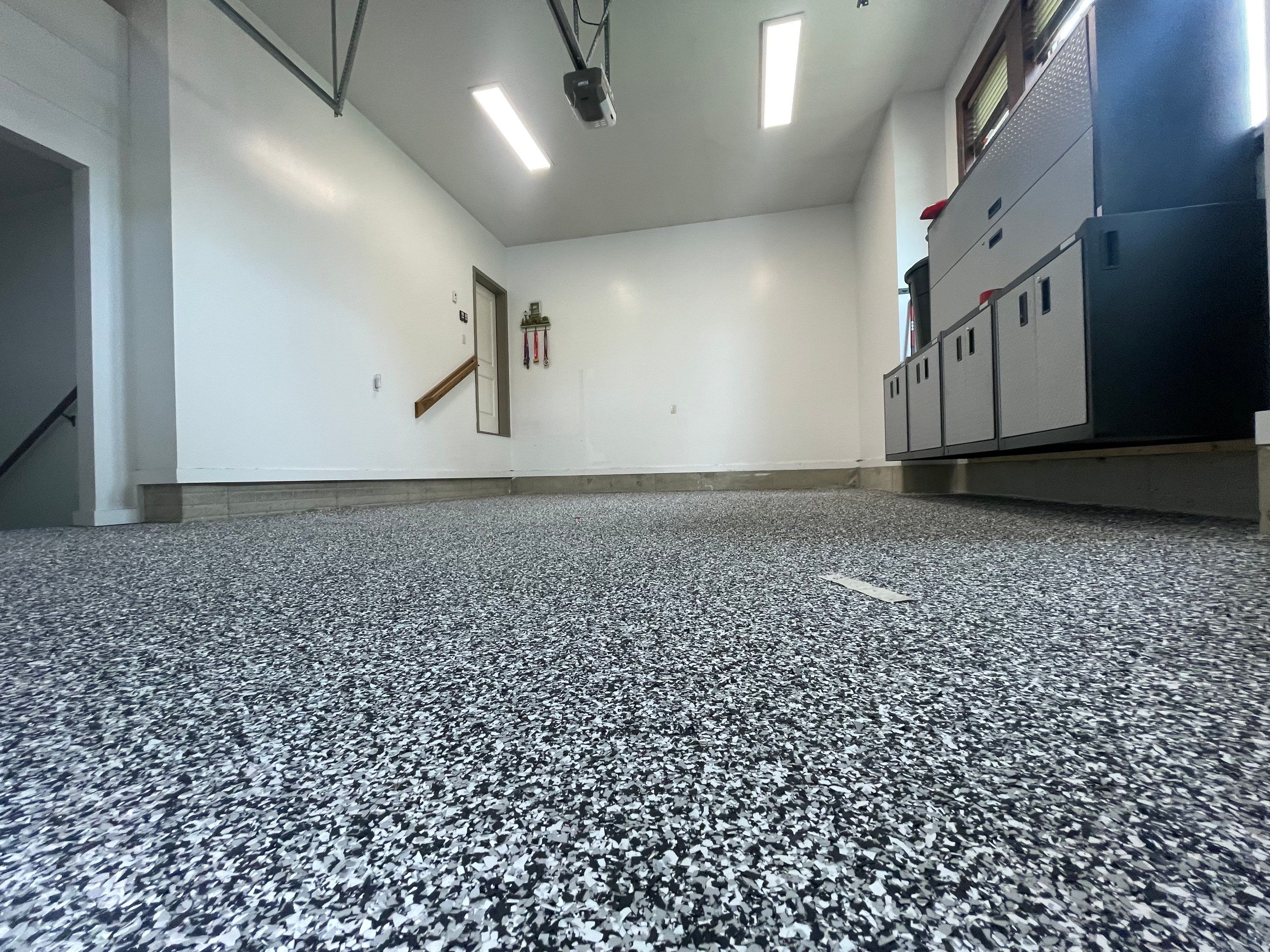 Garage Floor Coating and Domino Flake Finish in Sioux Falls by Select Painting, Coatings & Garage Cabinets