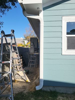 Gutter Installation using K-Style White Seamless Gutters