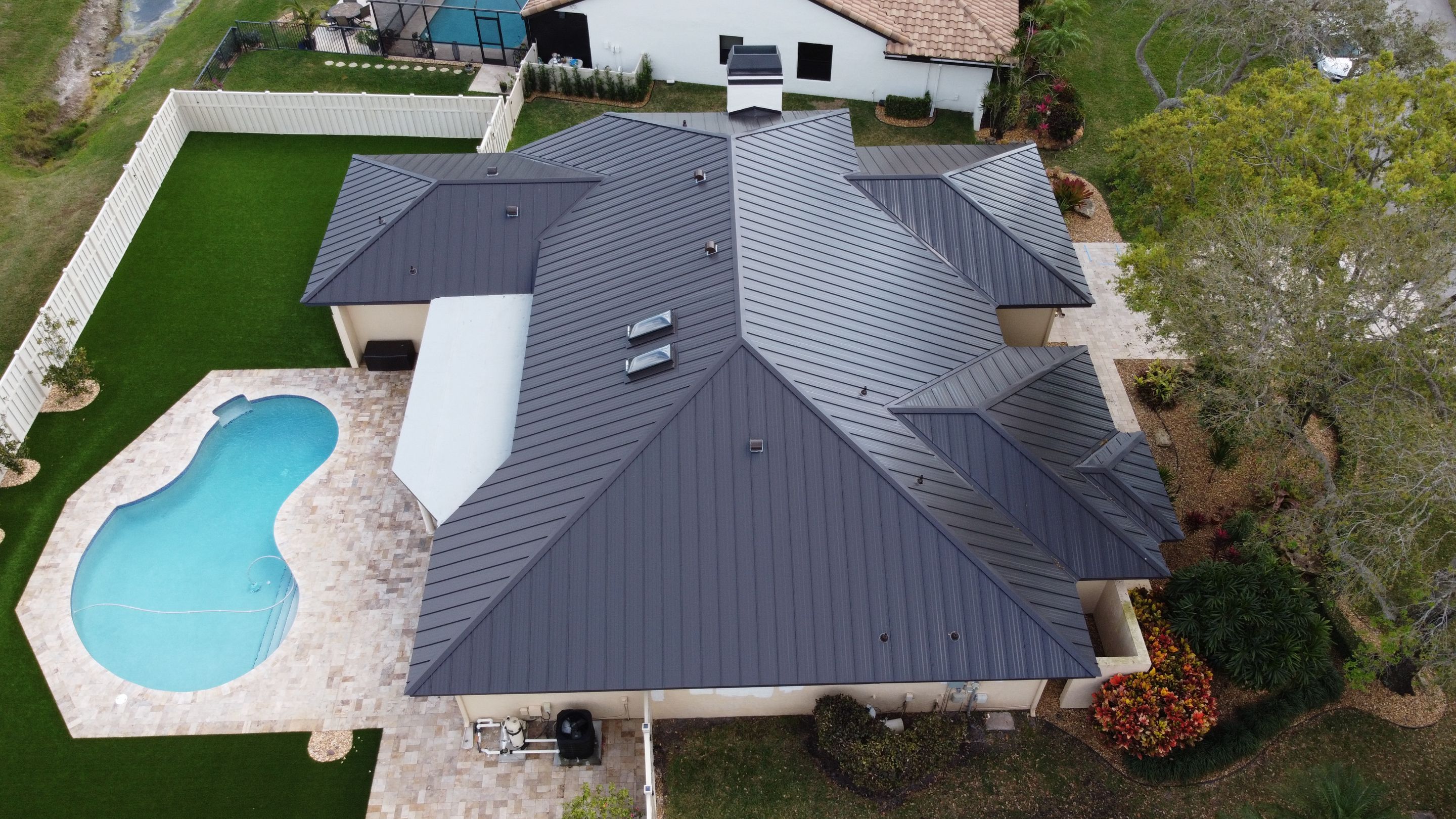 Residential Roofing Installation using 1" Nail strip metal roof by BLUES BROTHERS CONSTRUCTION CORP