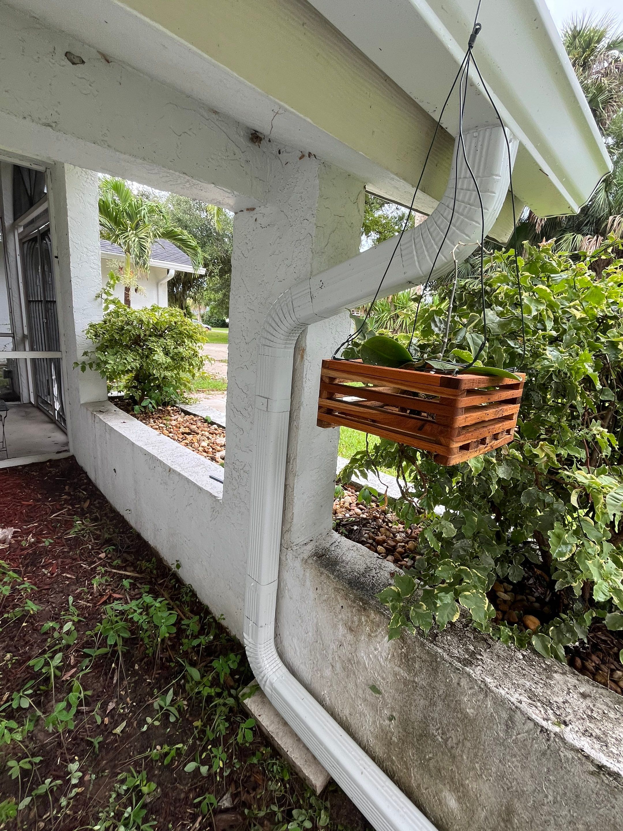 White Seamless Gutters with Splash Guards in North Fort Myers FL by Gutter Professor   by Gutter Professors