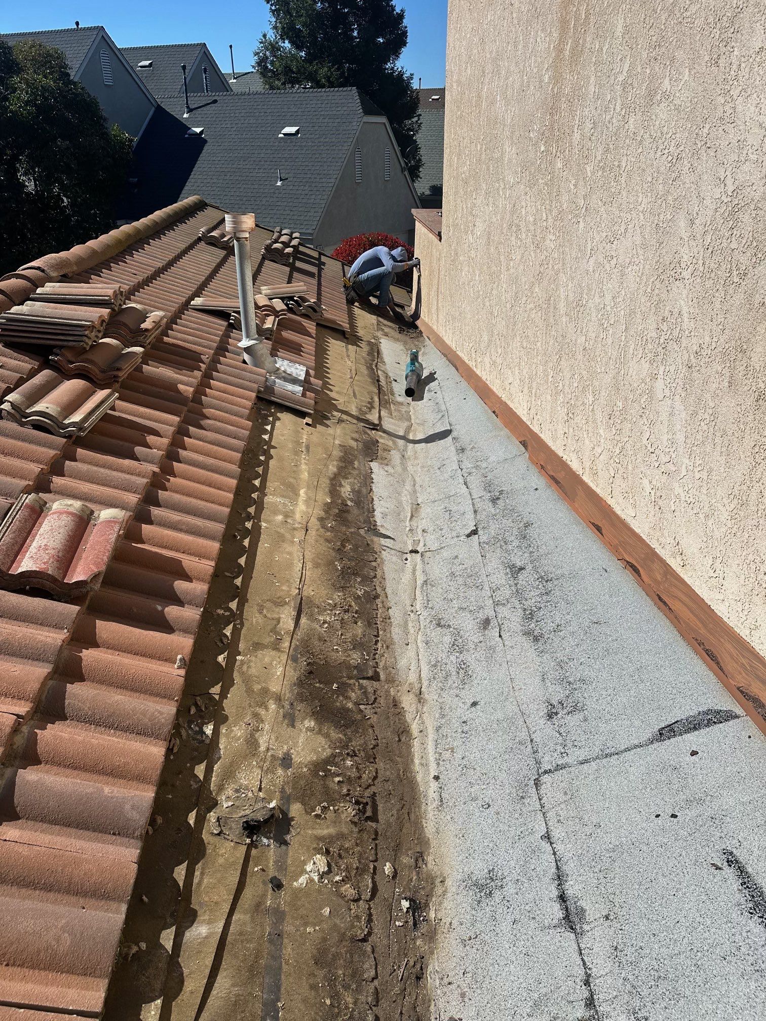Tile Roof repair by Grandmark Service Company