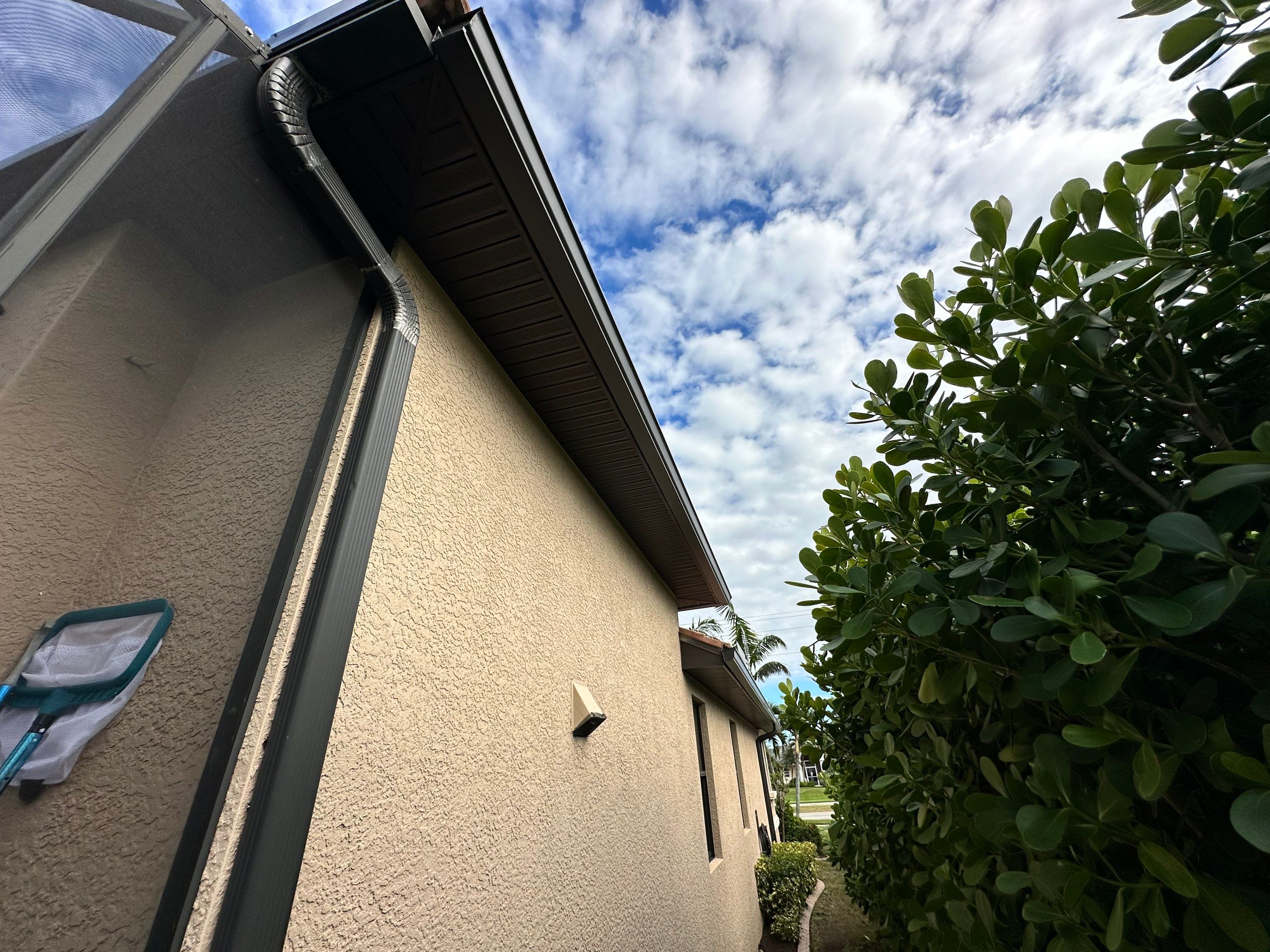 Bronze Downspout Installation in Cape Coral FL by Gutter Professors