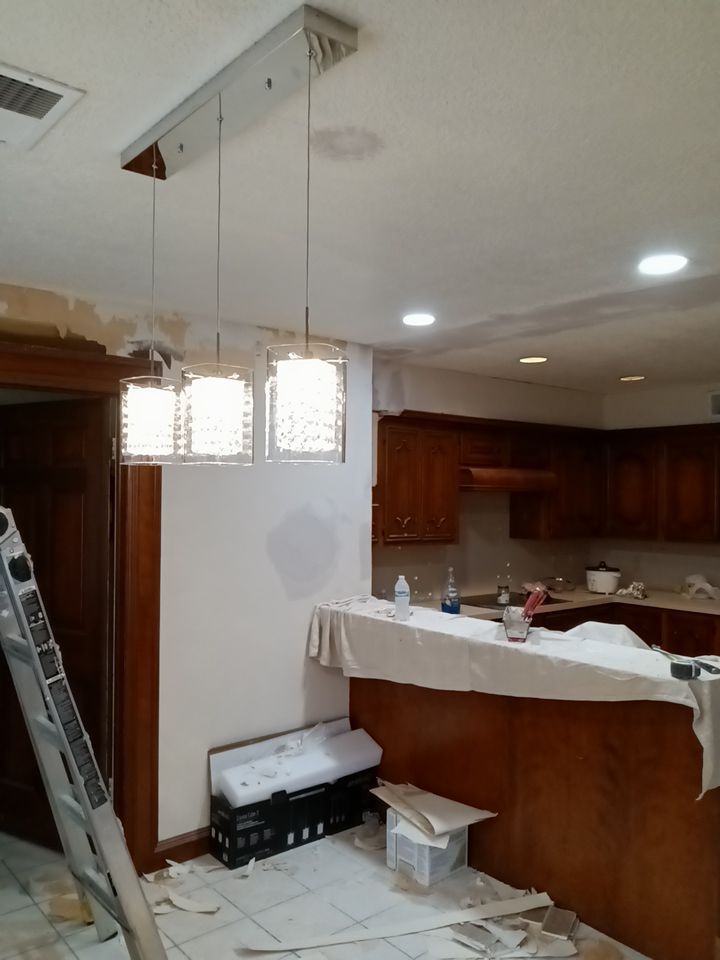 Interior and exterior painting project by Roof Concepts Construction