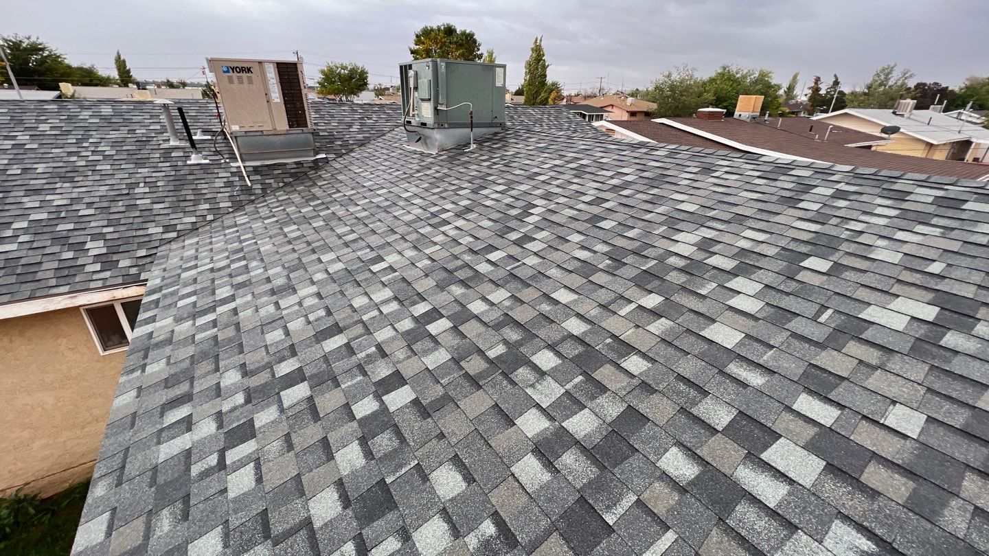 Onyx Black Shingles by Reimagine Roofing