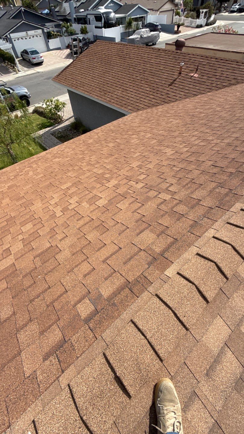 Asphalt Shingle Roof Rejuvenation and Vent Sealing in San Diego by Reliable Roofing San Diego Inc.