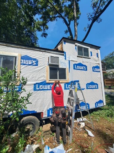tiny home remodel- siding,paint,roofing by Nailed It Roofing & Remodeling LLC