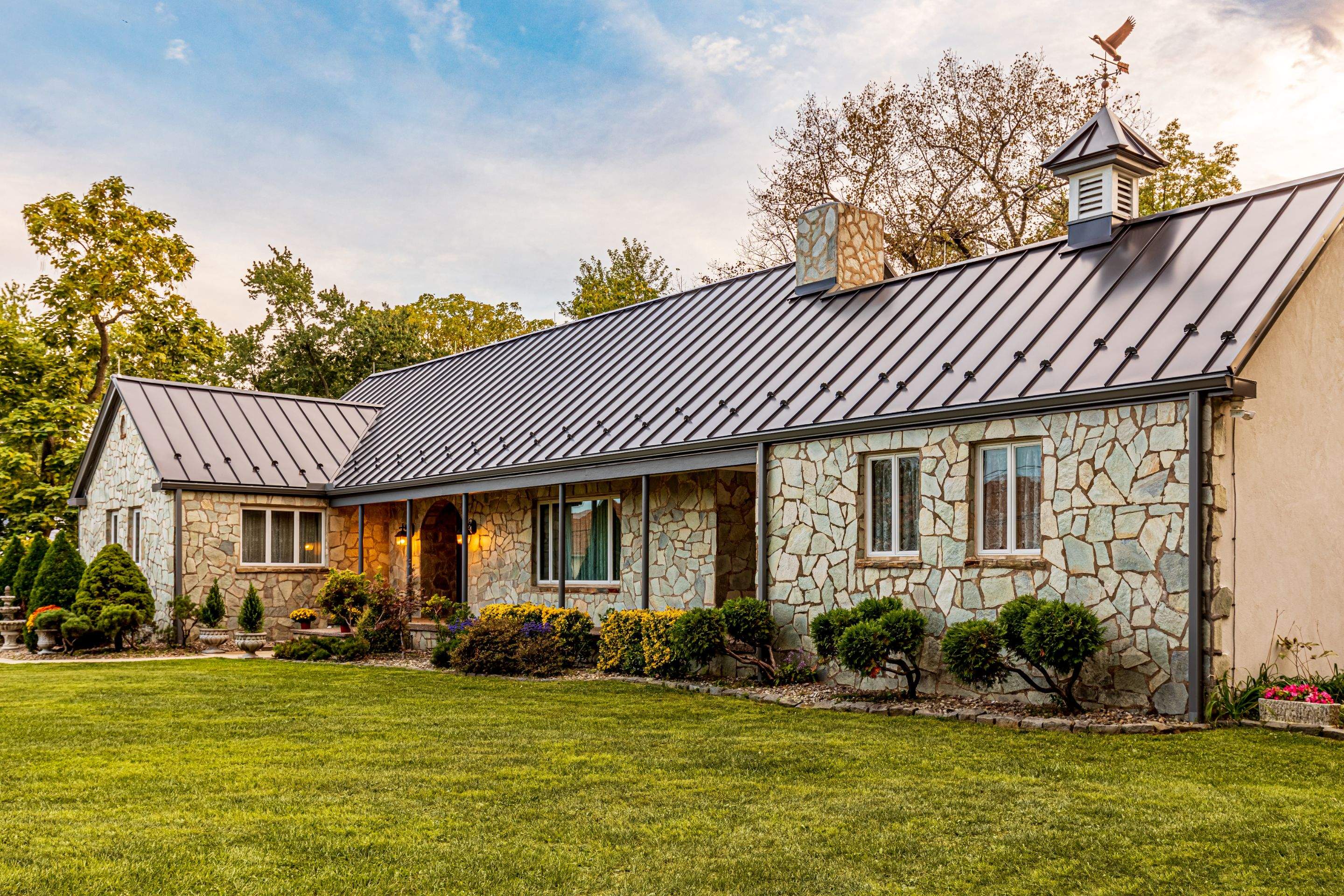 Standing Seam Metal roof-black by Esh Builders