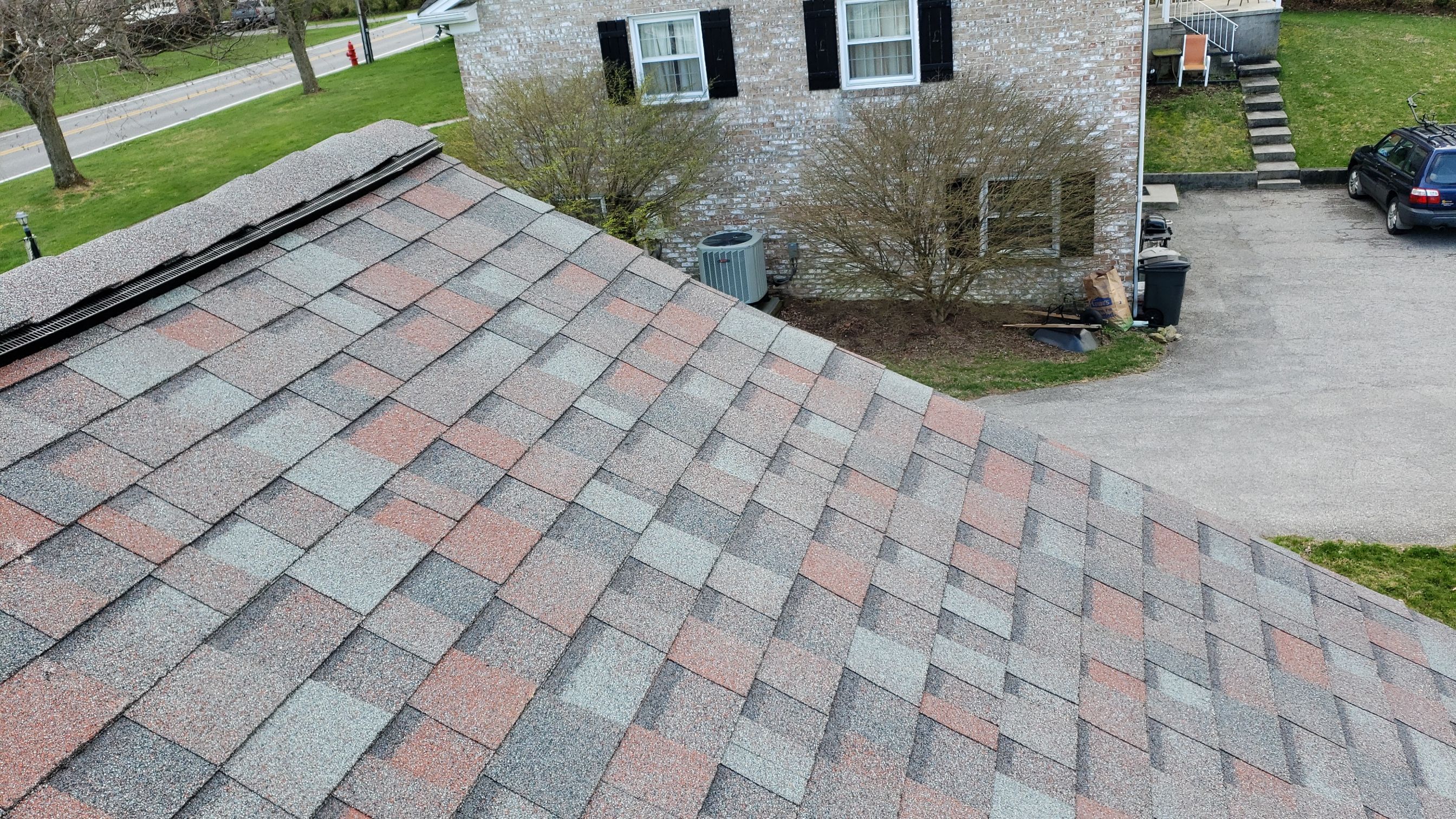 Residential Roofing Installation using Owen's Corning Colonial slate.  by Roof Right Inc