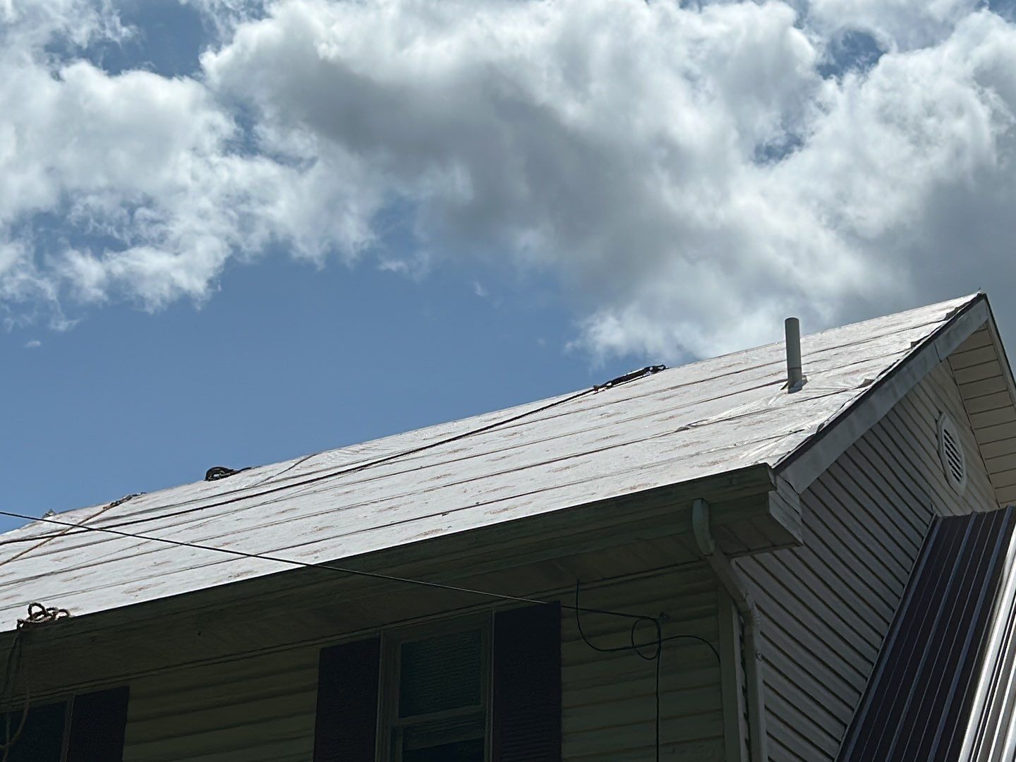 Residential Roofing Installation using Metal by Mr. Roofer