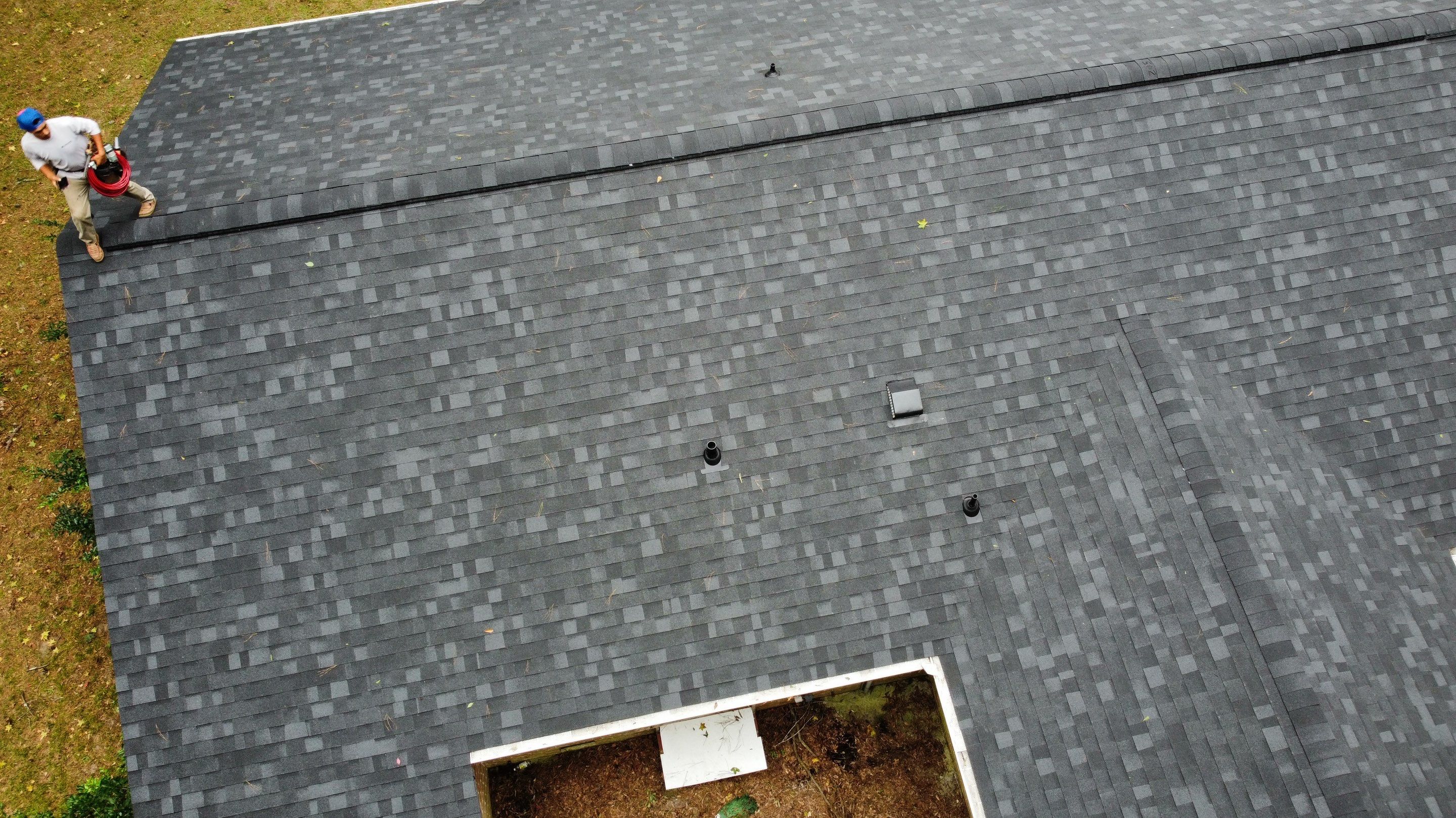 New Onyx Black Shingle Roof Replacement and Tree Damage Repair. by Midlands Roofing & Exteriors