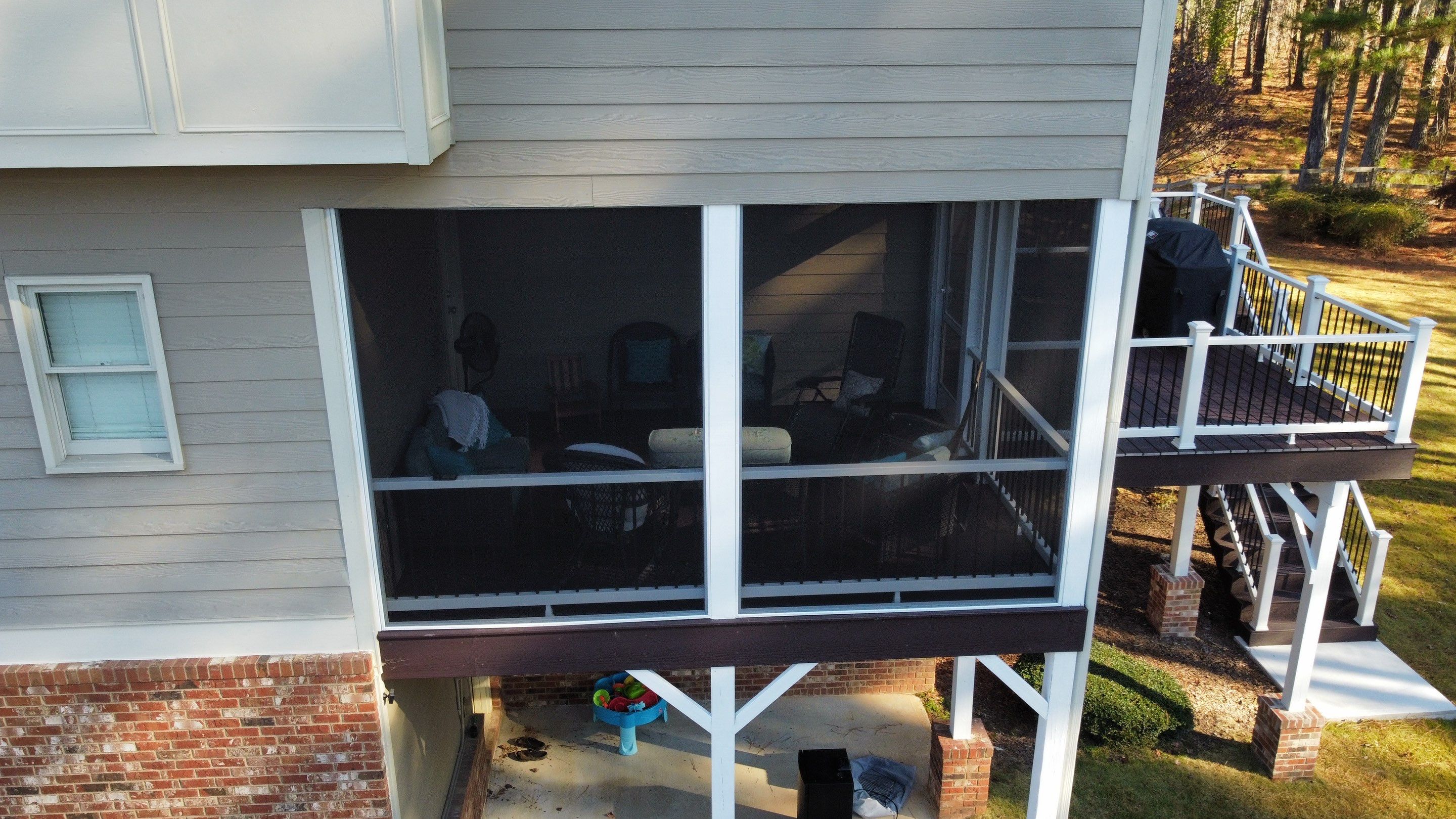 Multi-Level Composite Deck and Screened Porch in Acworth by Swift Home Renovations 