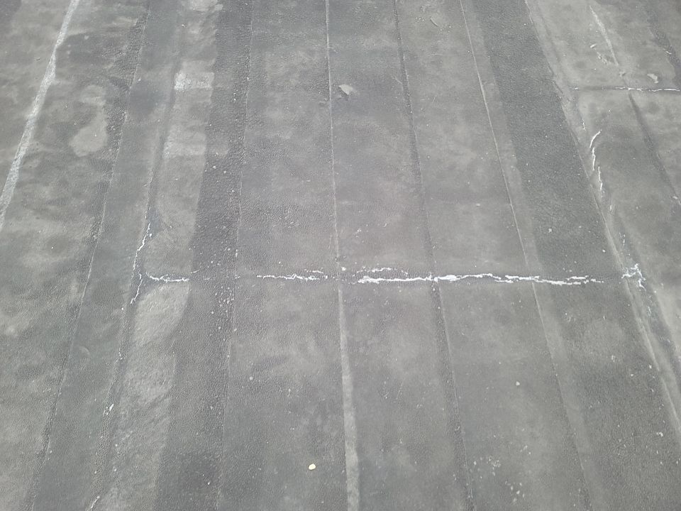 Commercial Roofing Repair using UniFlex Silicone Roof Coating by 3 Daughters Construction 