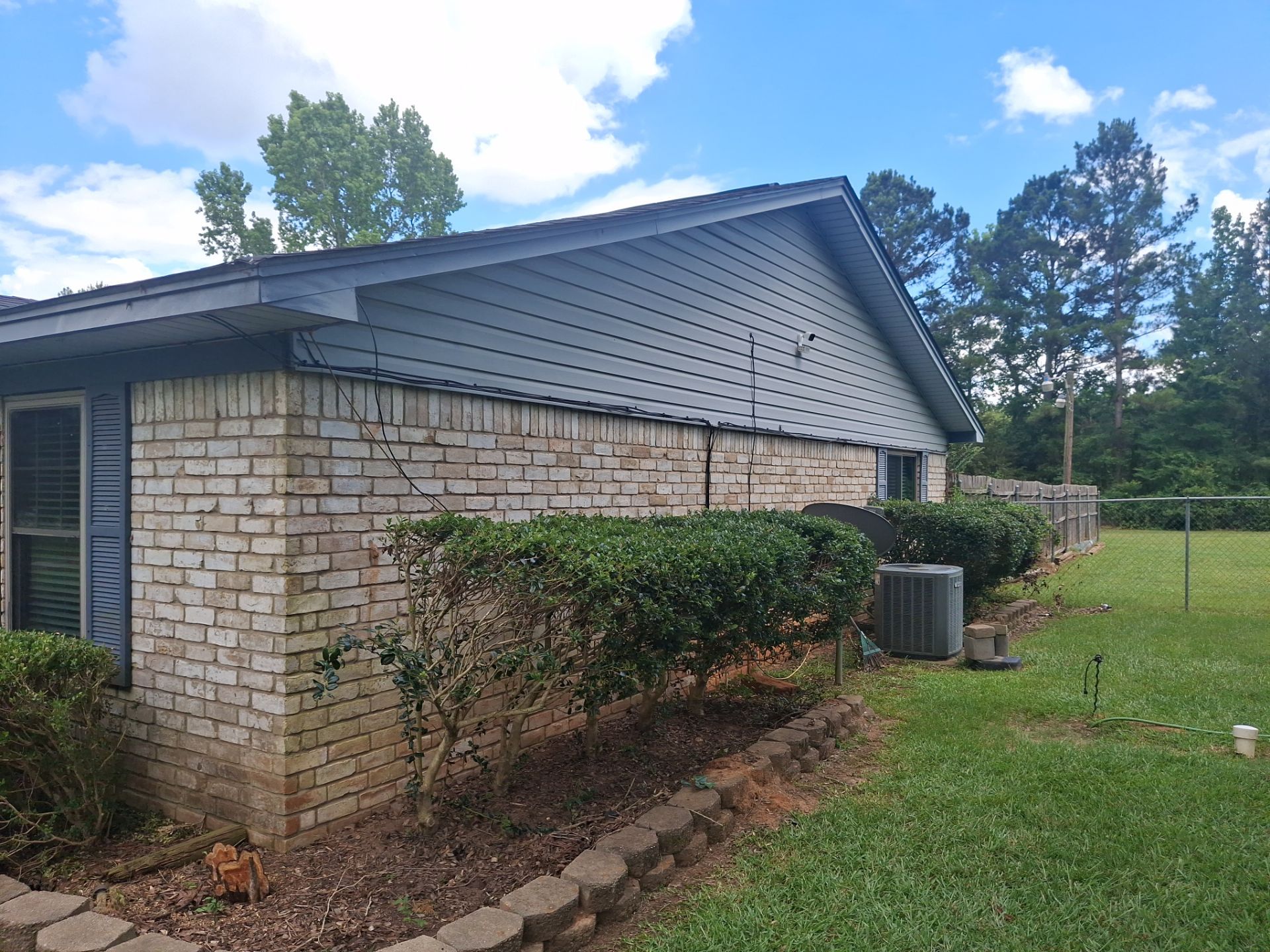 Exterior Refresh Brick Painting Job in Overton, TX by Quality Coats Painting