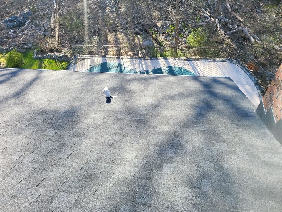 Residential Roofing Installation using onyx black by A Plus Exterior