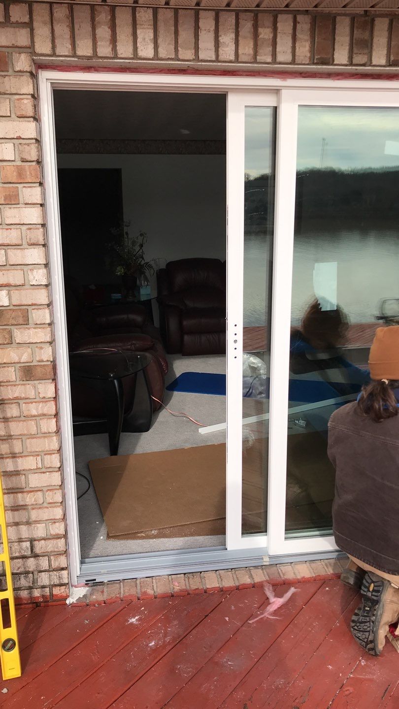 Deck Refurbush and Door Replacement using Trex Decking and Railing. Polaris Patio Doors by Secure Construction Company Inc