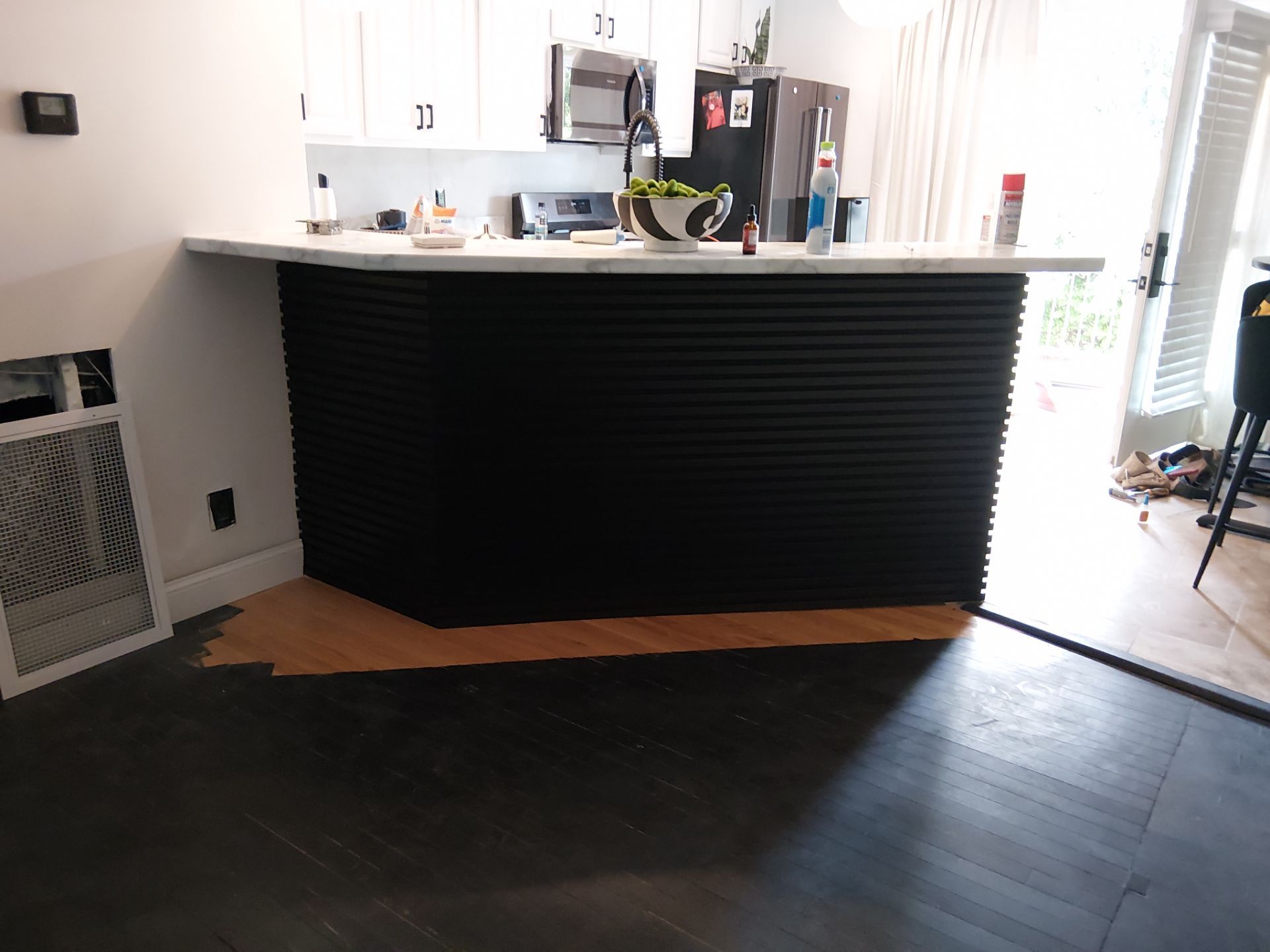 Kitchen Refresh and Hardwood Floor Restoration in Clayton by Legendary Services Company LLC.