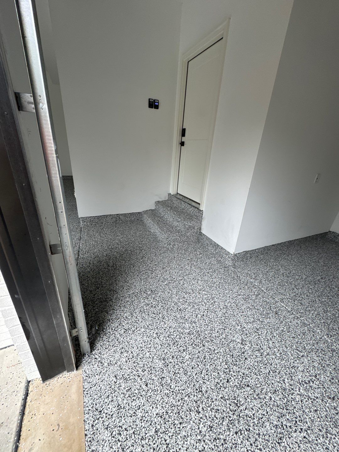 Domino Garage Floor Coating by Level 10 Coatings