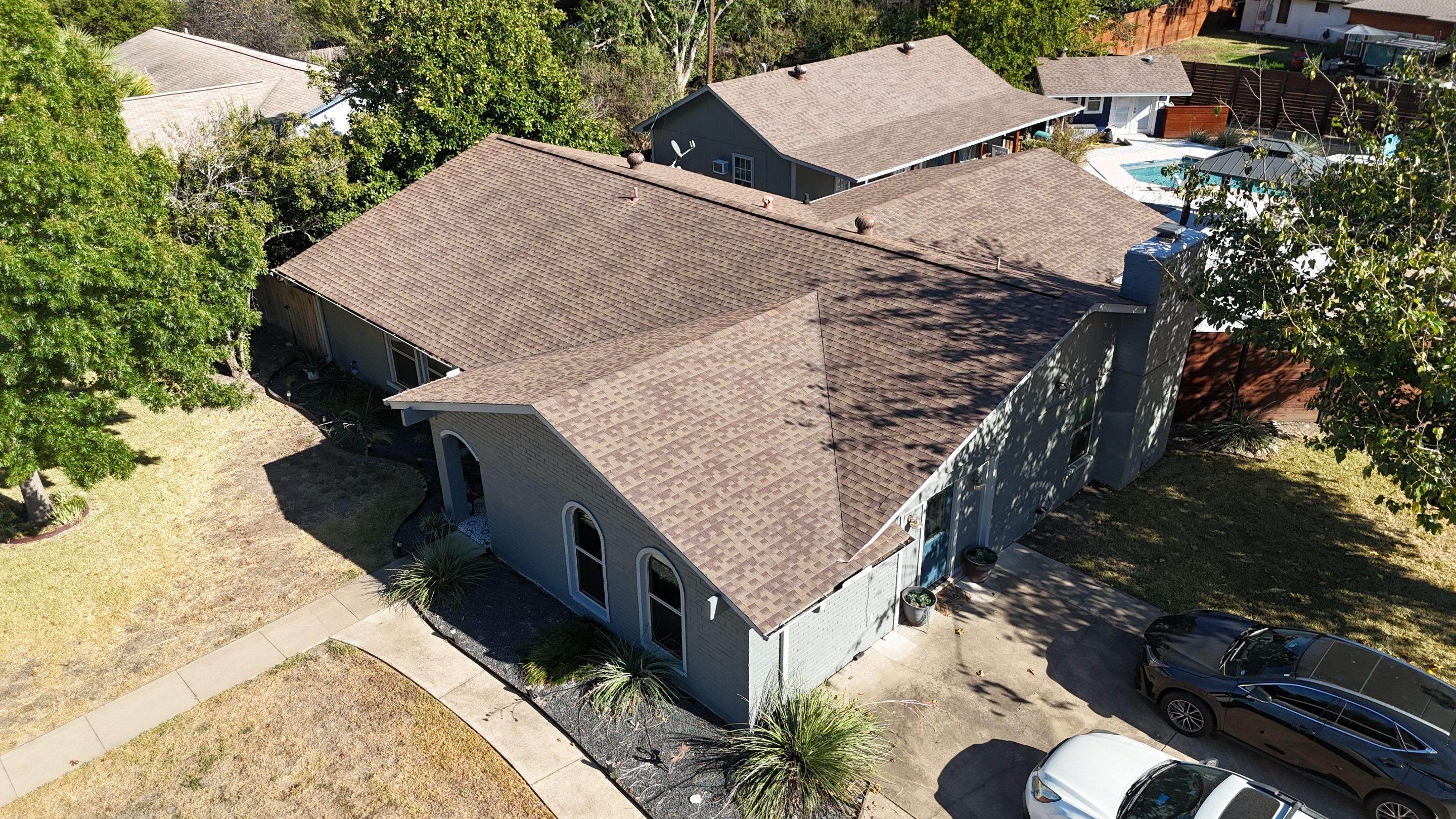 Residential Roof Replacement using Matte Black 24g by Action Exteriors Austin