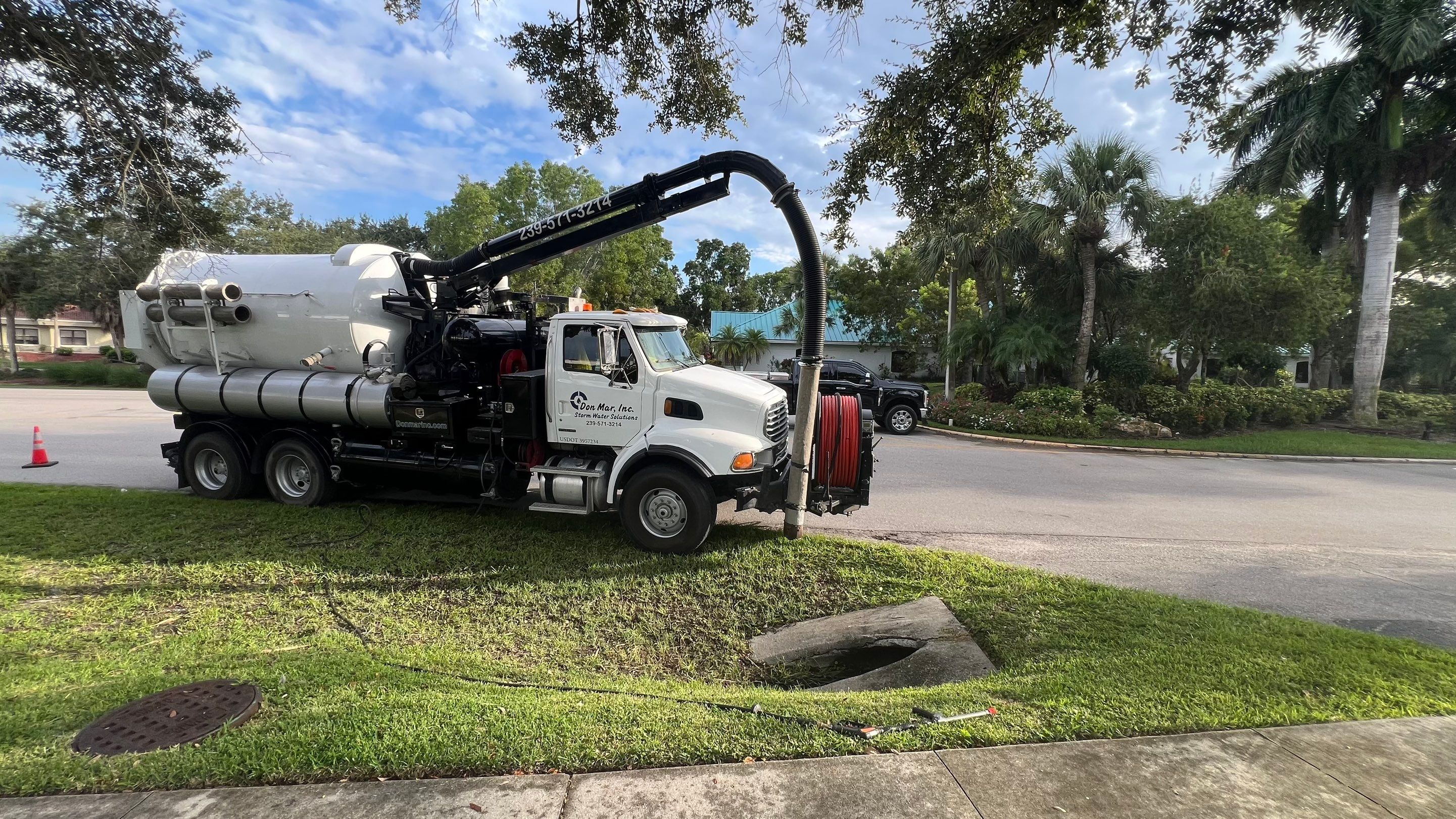 Naples Community Entry Road Stormwater System Cleaning by APS Power & Water