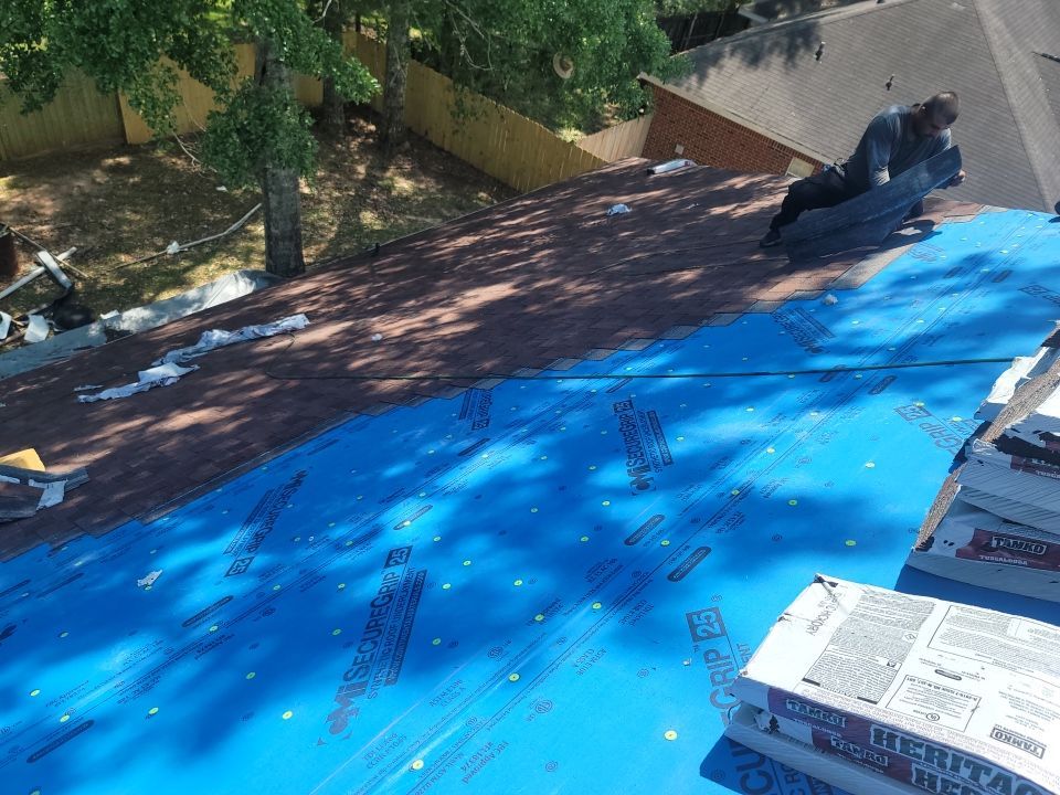 Residential Roofing Installation using Roof Replacement by American Roofing & Construction LLC