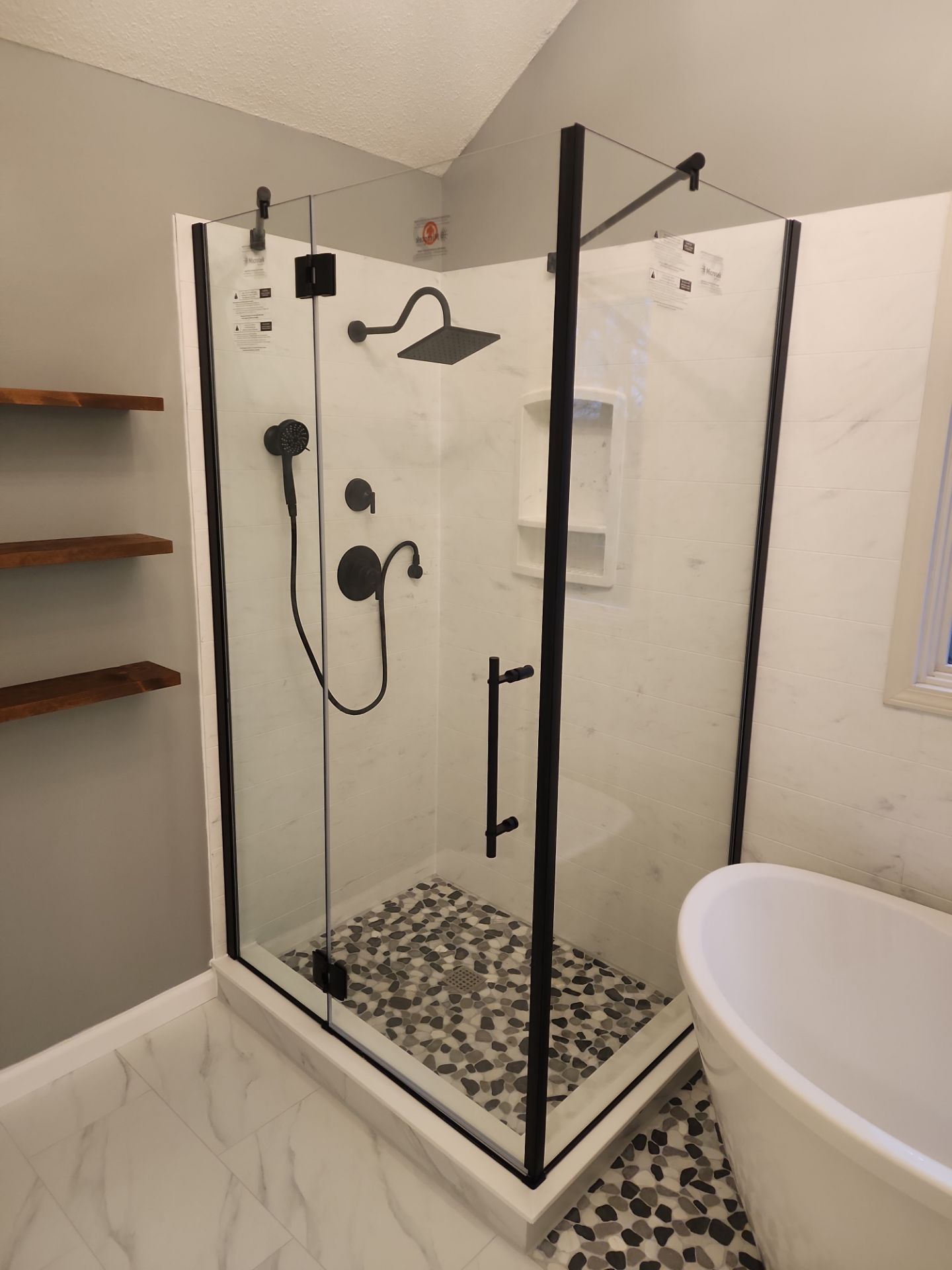 Beautiful use of many materials by The Shower Company