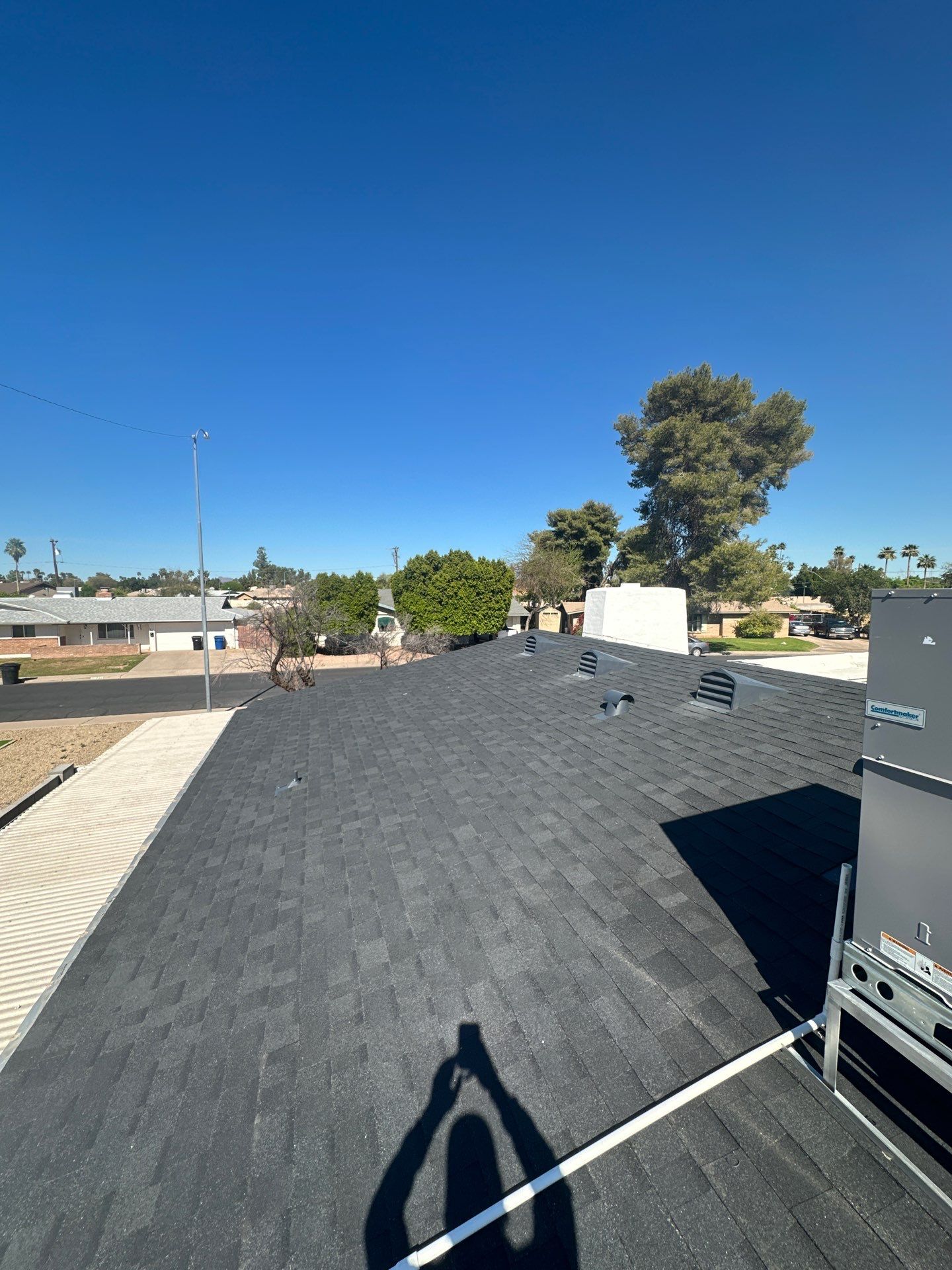 Onyx Black Shingles by Reimagine Roofing