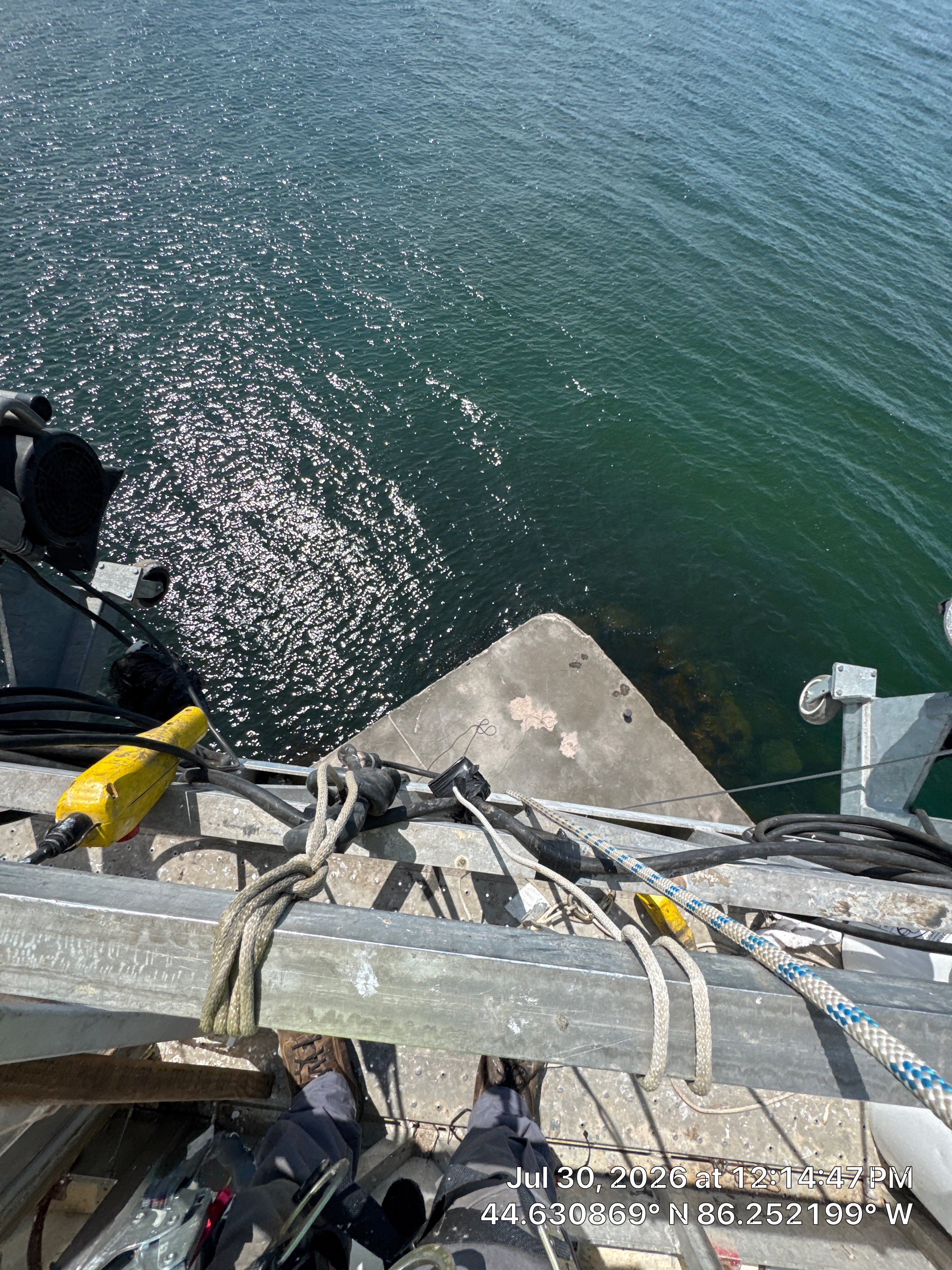 Historical Restoration and Coating of Frankfort North Breakwater Lighthouse by Finkle Preservation & Construction 